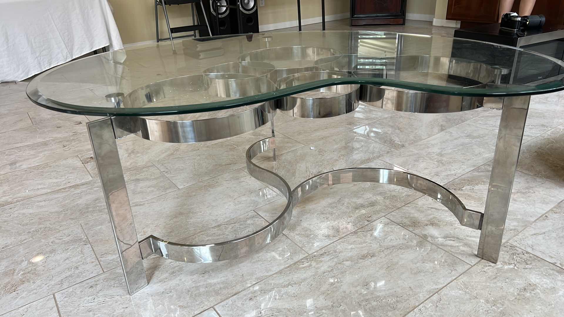 Photo 1 of MODERN SCULPTURED STEEL GLASS AND CHROME COFFEE TABLE 52” x 36” H20”