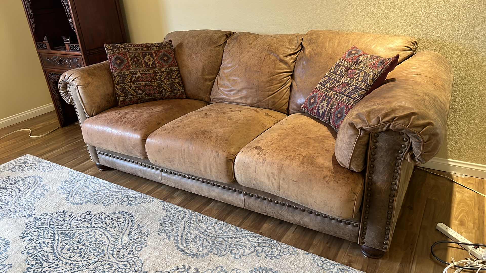 Photo 1 of 6’ TAN DISTRESSED LEATHER SOFA W NAILHEADS STUDDED TRIM (SEE PICTURES FOR WEAR)