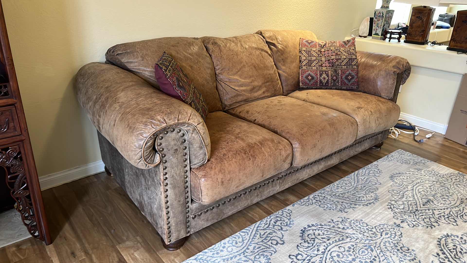 Photo 1 of 6’ TAN DISTRESSED LEATHER SOFA W NAILHEADS STUDDED TRIM (SEE PICTURES FOR WEAR)