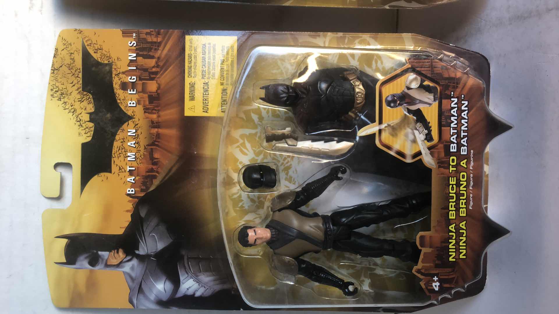 Photo 1 of NIB BATMAN BEGINS NINJA BRUCE TO BATMAN AND SKULL STRIKE SCARECROW ACTION FIGURES AND ACCESSORIES