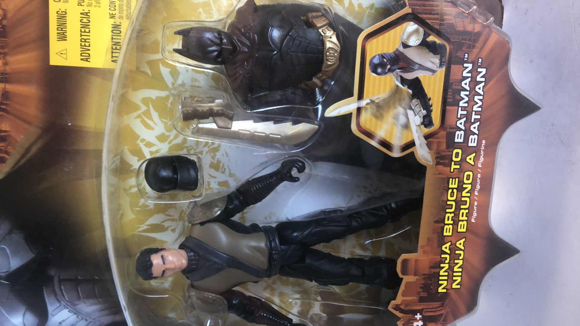 Photo 1 of NIB BATMAN BEGINS NINJA BRUCE TO BATMAN AND SKULL STRIKE SCARECROW ACTION FIGURES AND ACCESSORIES