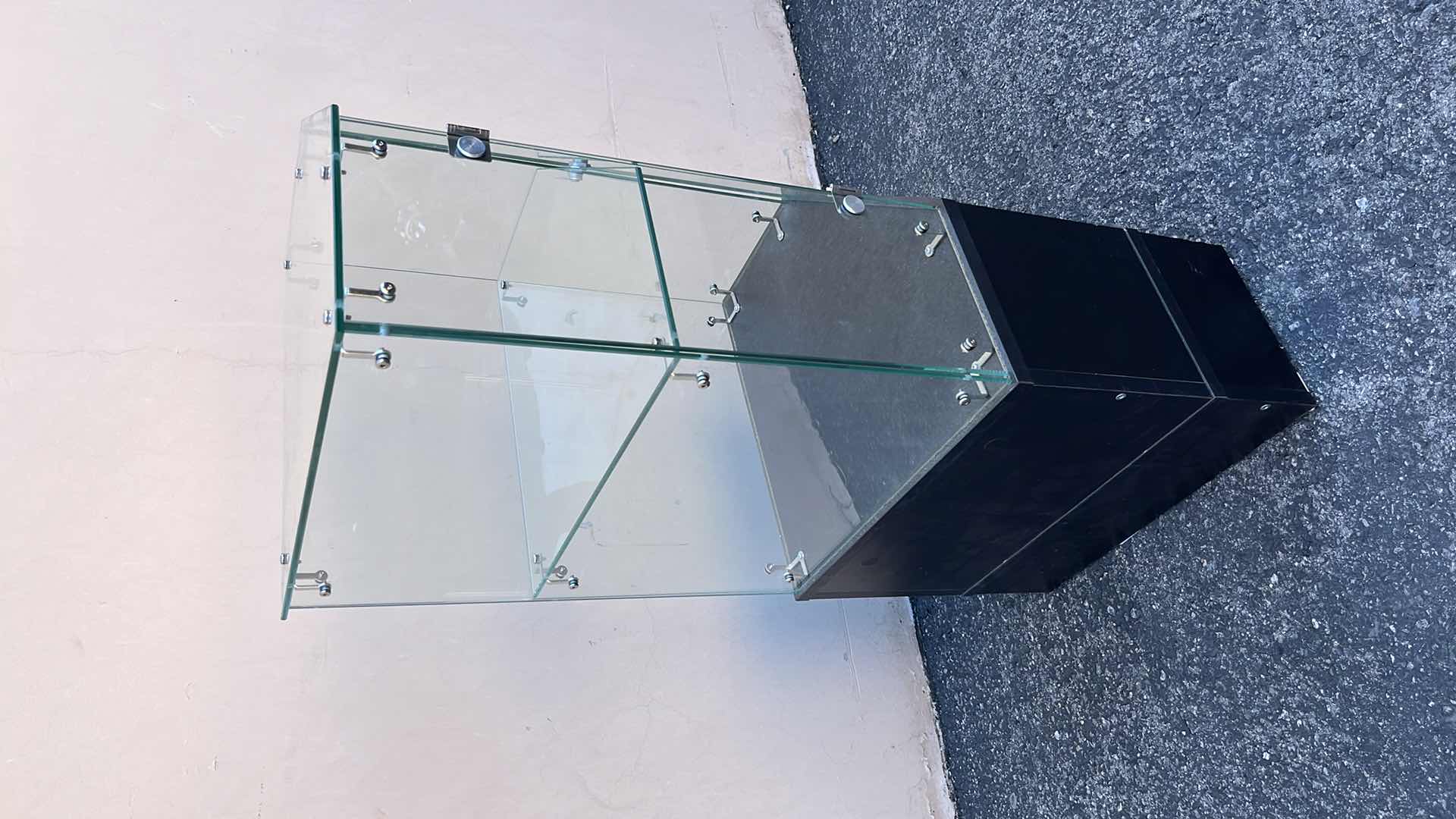 Photo 1 of CORNER GLASS DISPLAY CASE 18” X 18” H38.25” (1)