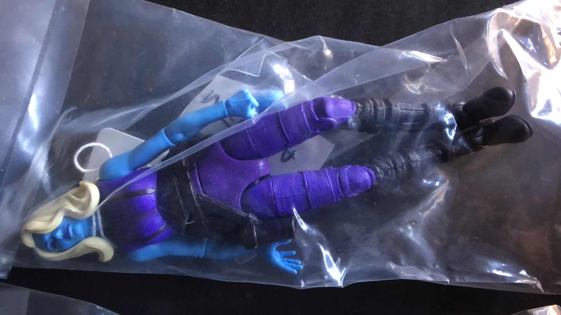 Photo 1 of ASSORTMENT OF UNBOXED ACTION FIGURES (4)