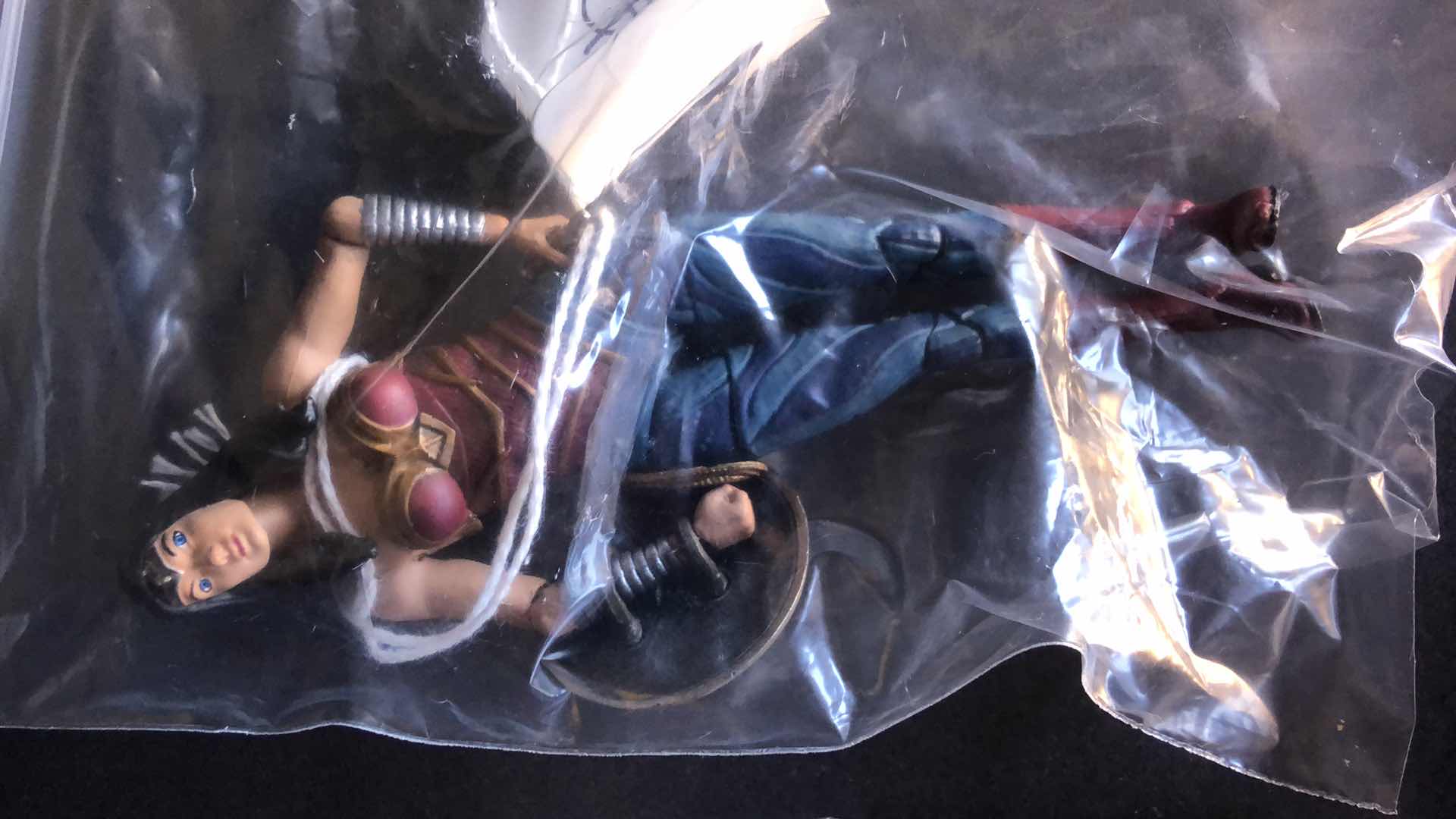 Photo 1 of ASSORTMENT OF UNBOXED ACTION FIGURES (4)