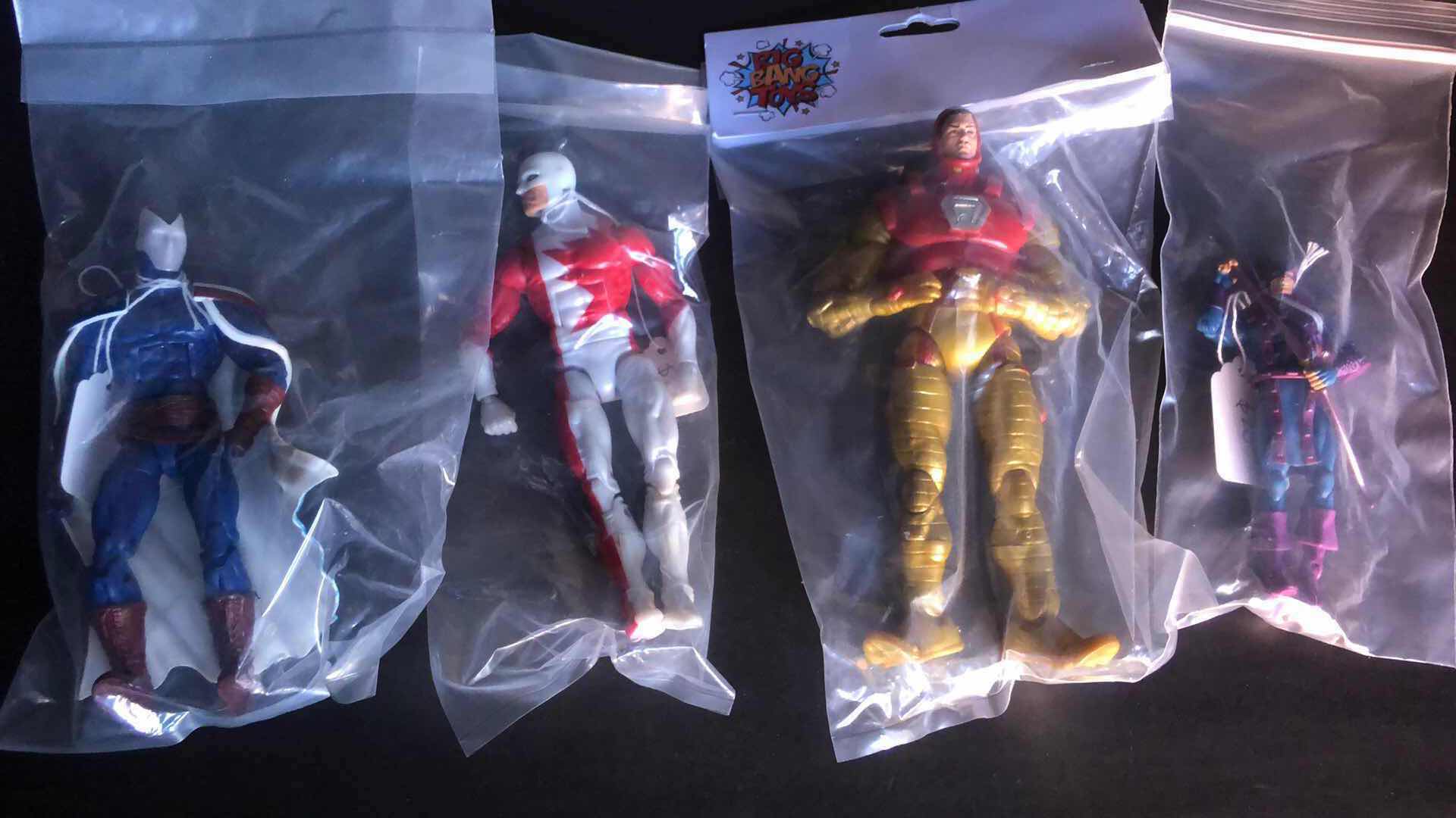 Photo 1 of ASSORTMENT OF UNBOXED ACTION FIGURES (4)