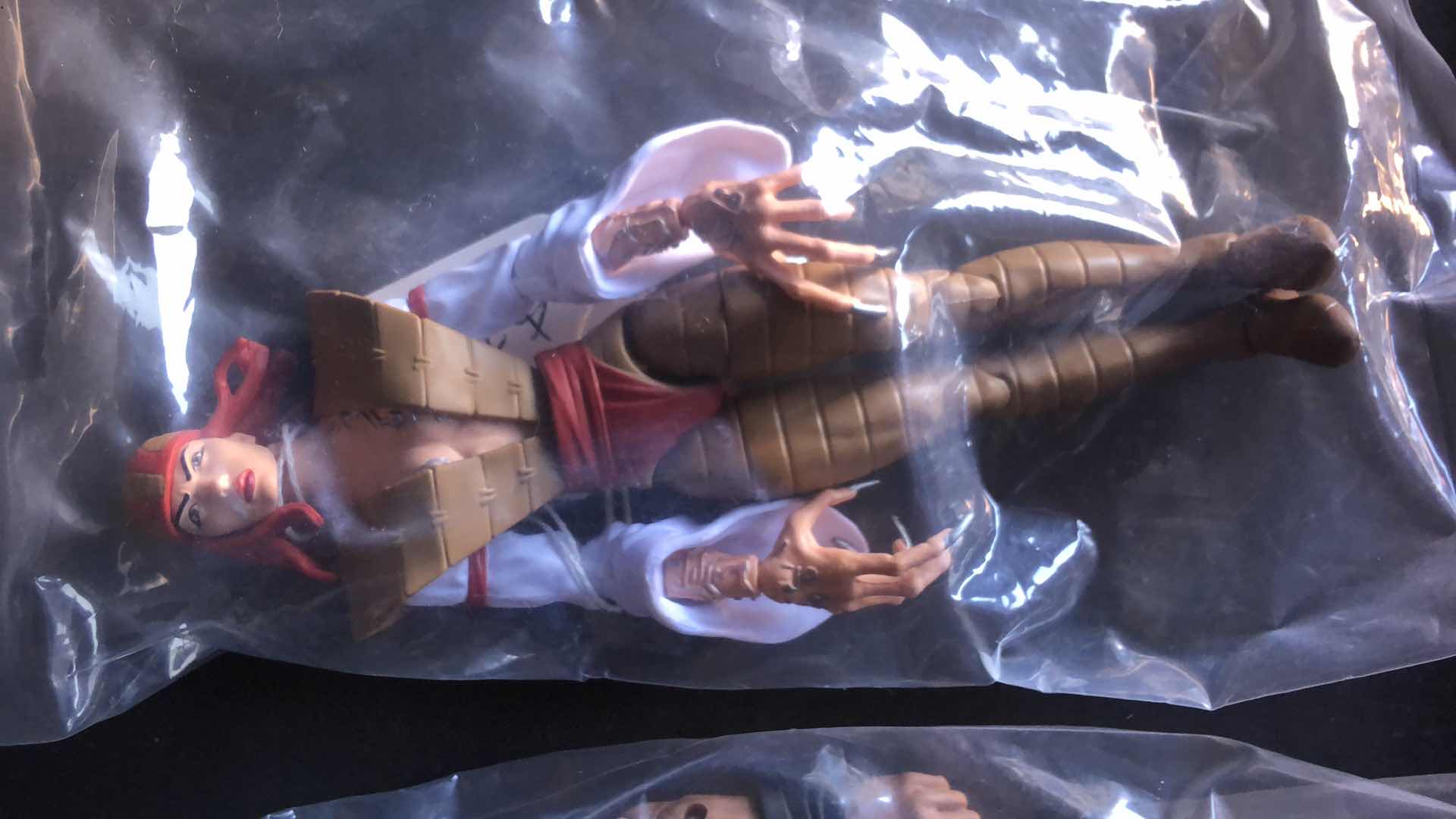 Photo 1 of ASSORTMENT OF UNBOXED ACTION FIGURES (4)