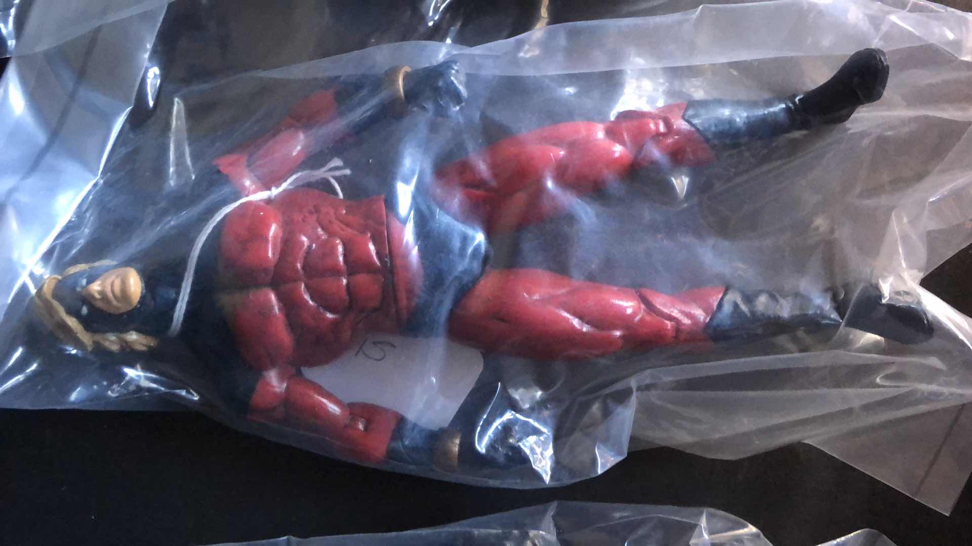 Photo 1 of ASSORTMENT OF UNBOXED ACTION FIGURES (4)