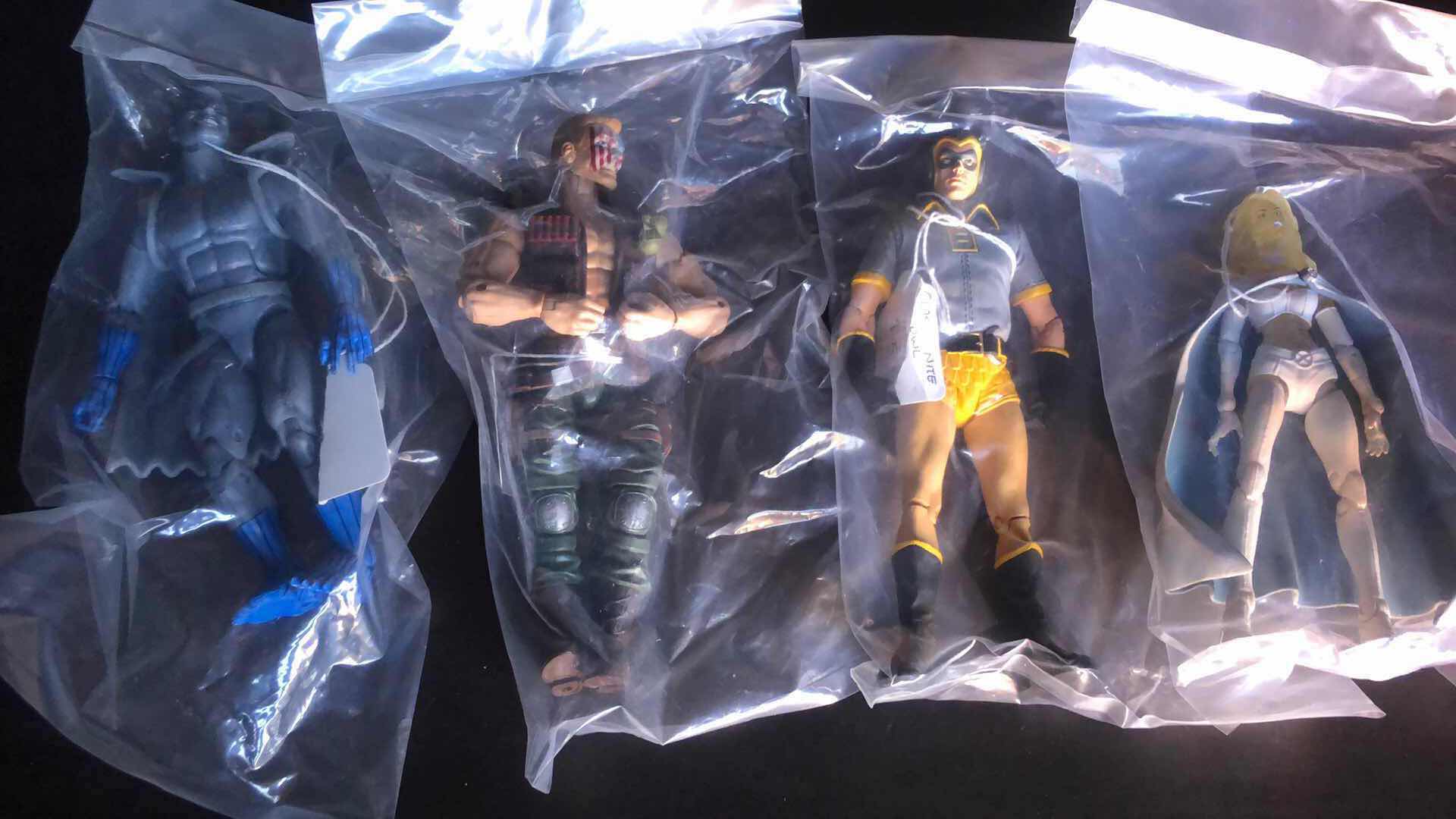 Photo 1 of ASSORTMENT OF UNBOXED ACTION FIGURES (4)