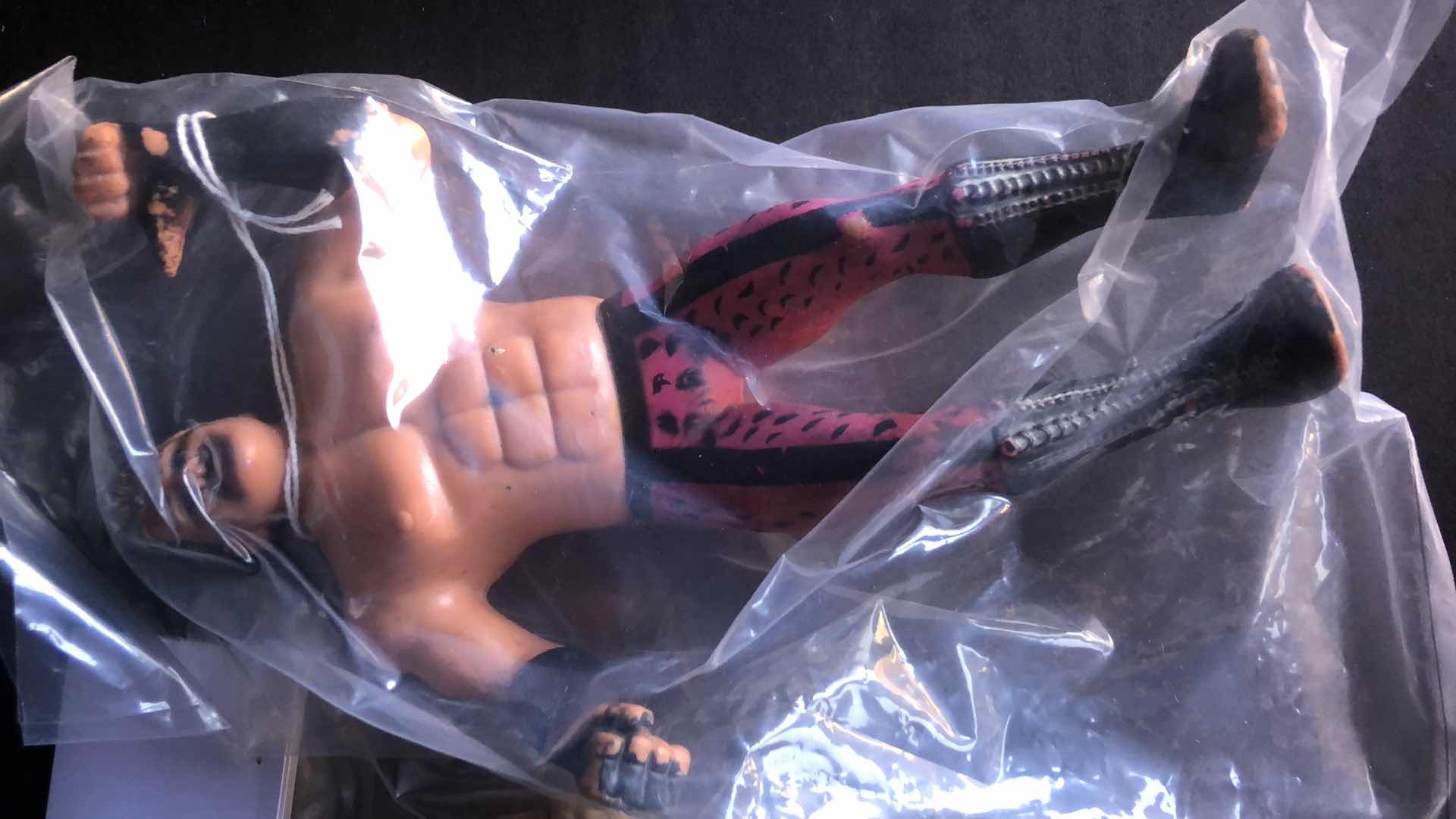 Photo 1 of ASSORTMENT OF UNBOXED WRESTLING ACTION FIGURES (4)