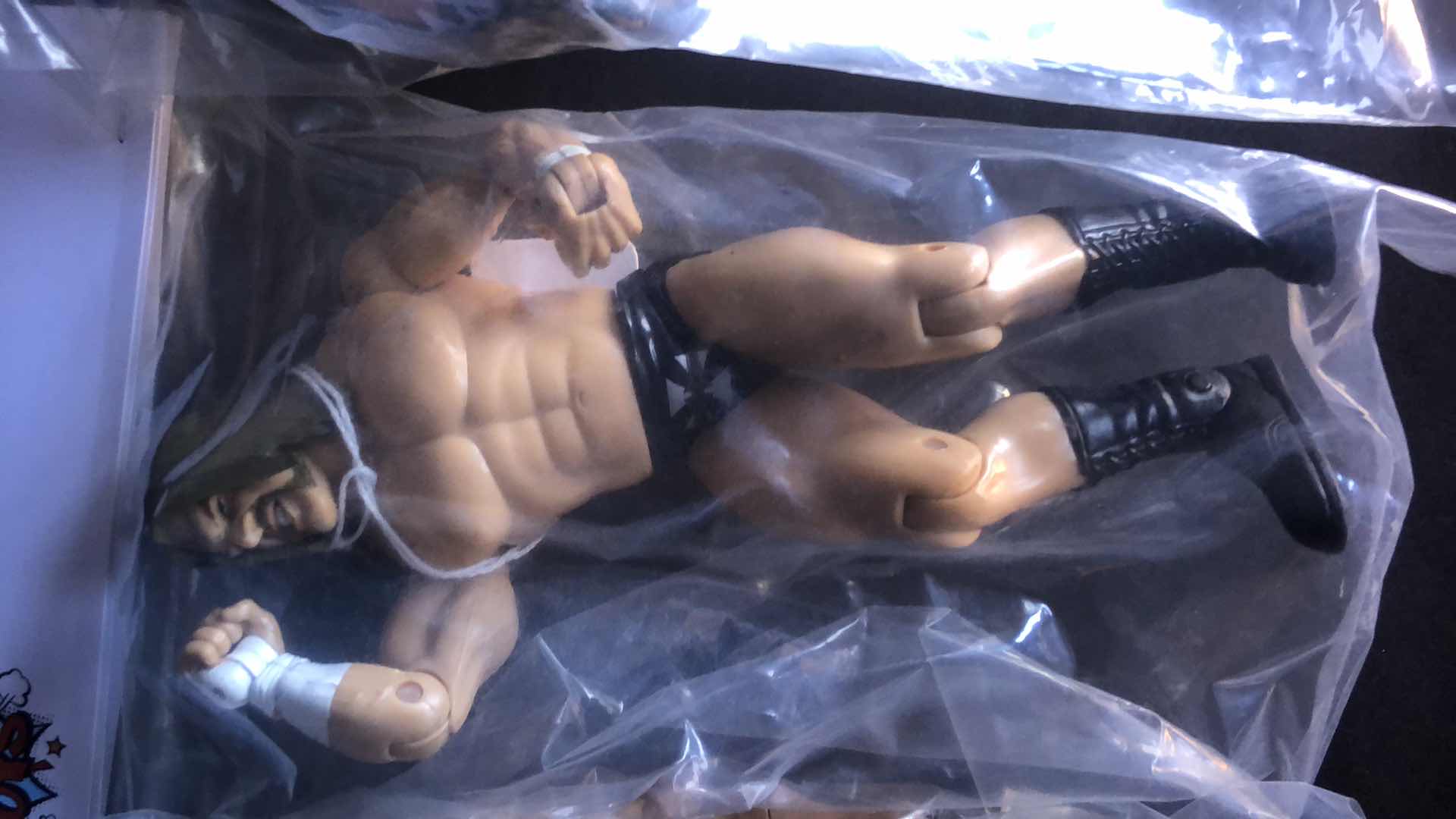 Photo 1 of ASSORTMENT OF UNBOXED WRESTLING ACTION FIGURES (4)