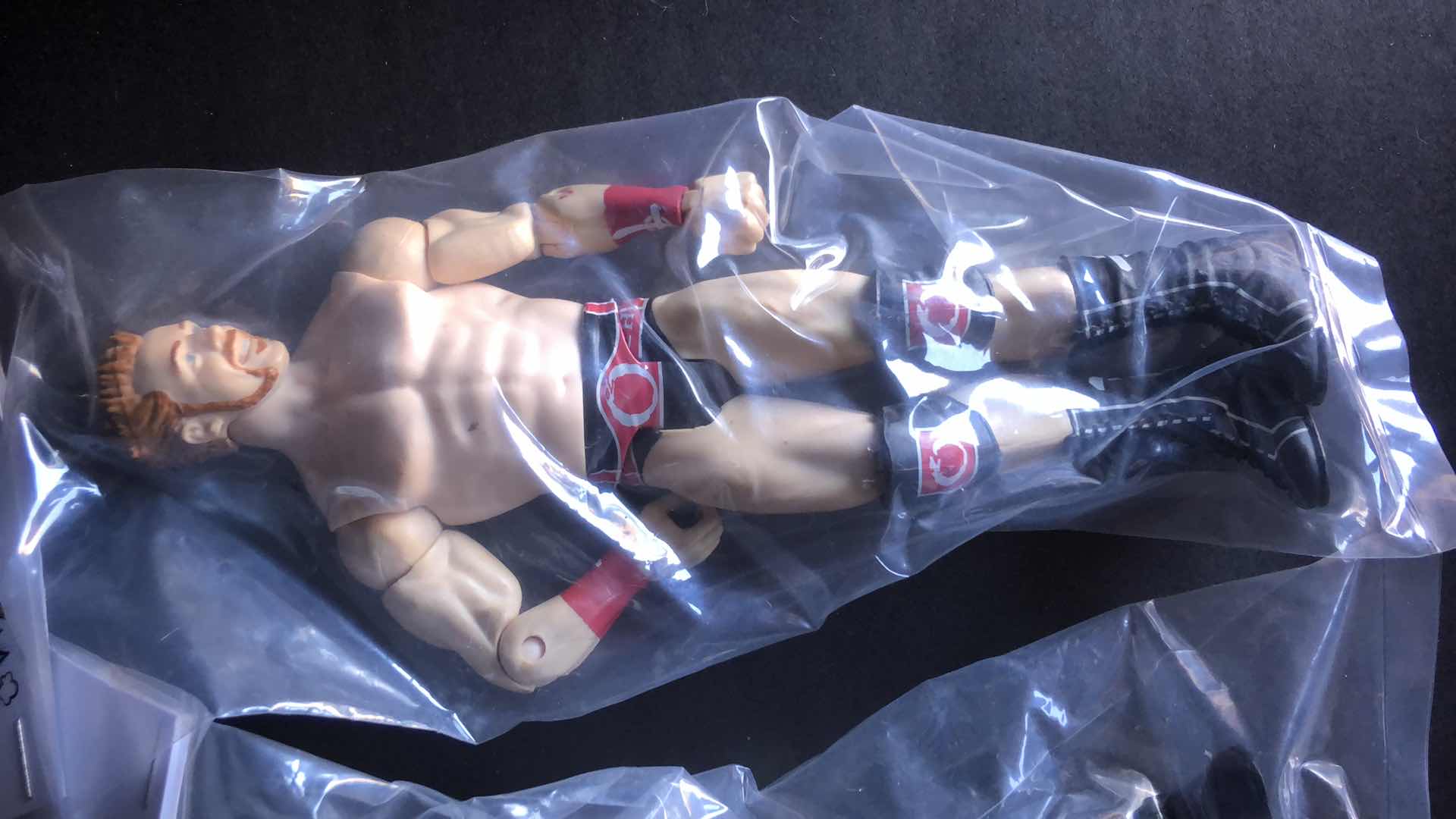 Photo 1 of ASSORTMENT OF UNBOXED WRESTLING ACTION FIGURES (4)
