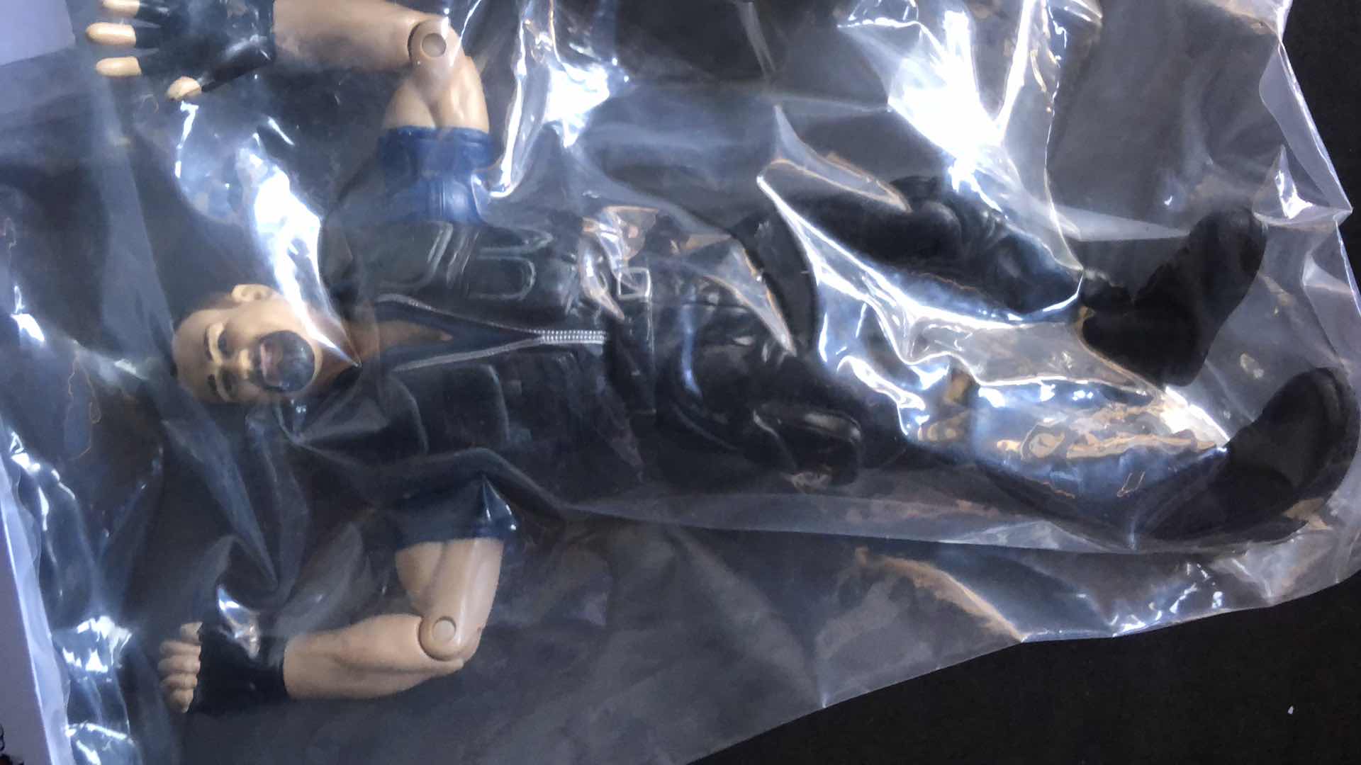 Photo 2 of ASSORTMENT OF UNBOXED WRESTLING ACTION FIGURES (4)