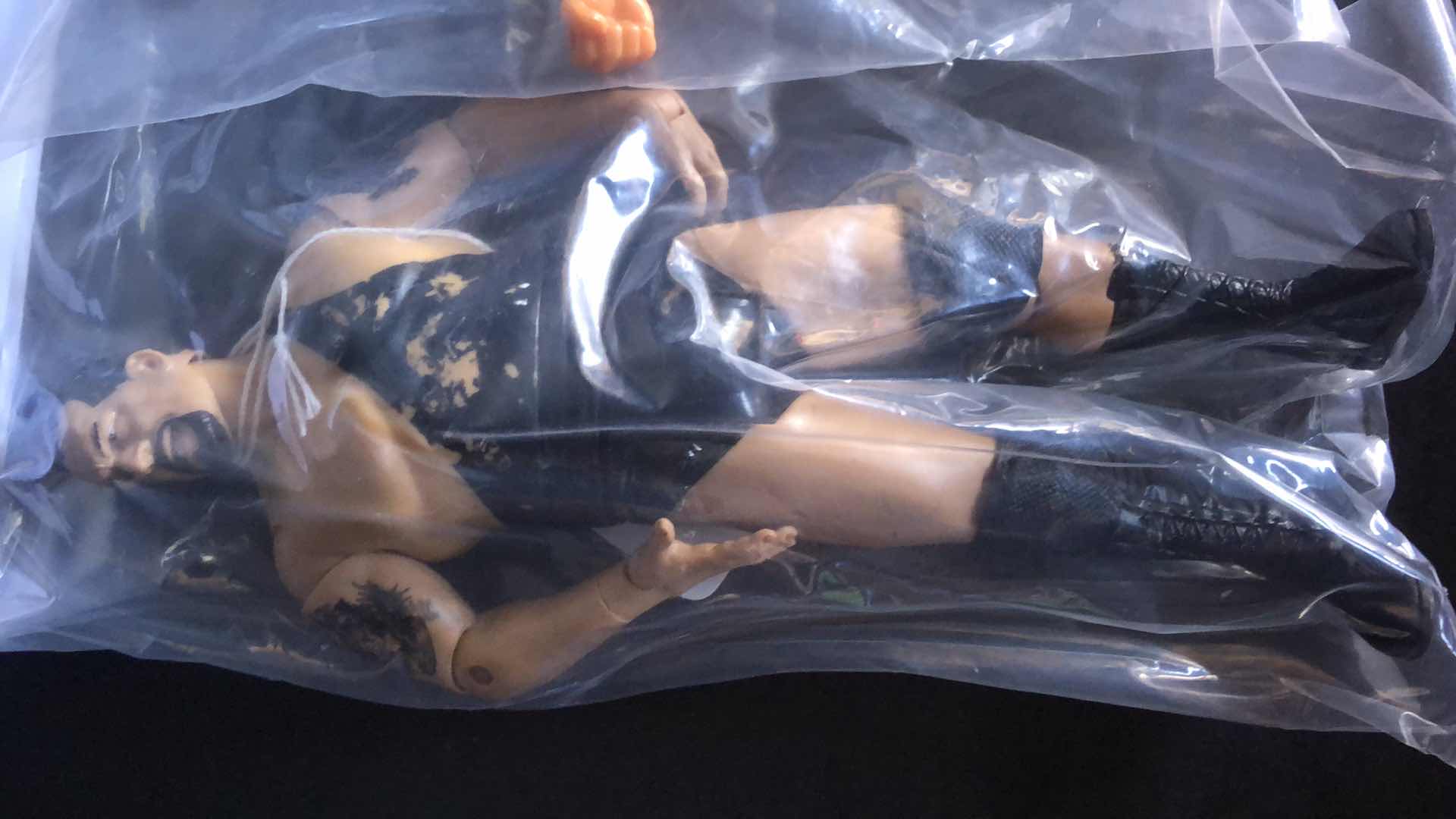 Photo 2 of ASSORTMENT OF UNBOXED WRESTLING ACTION FIGURES (4)