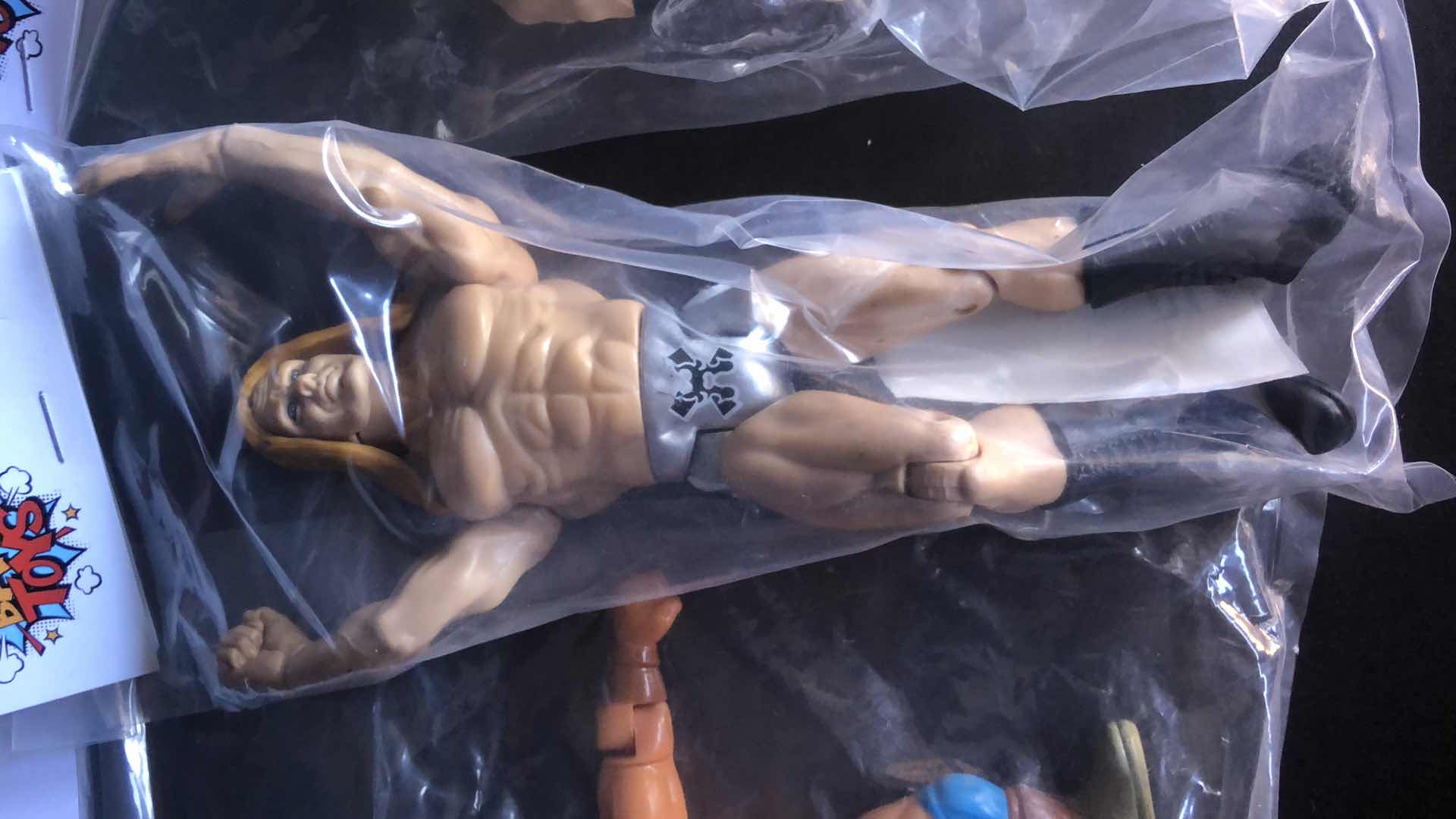 Photo 1 of ASSORTMENT OF UNBOXED WRESTLING ACTION FIGURES (4)