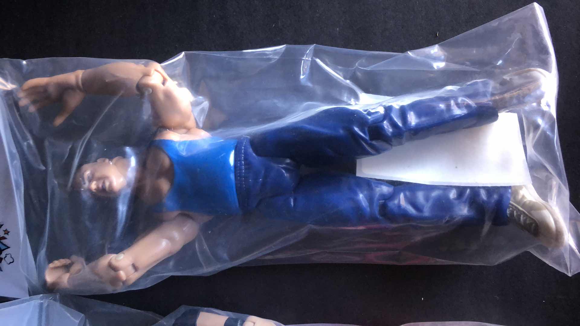 Photo 1 of ASSORTMENT OF UNBOXED WRESTLING ACTION FIGURES (4)
