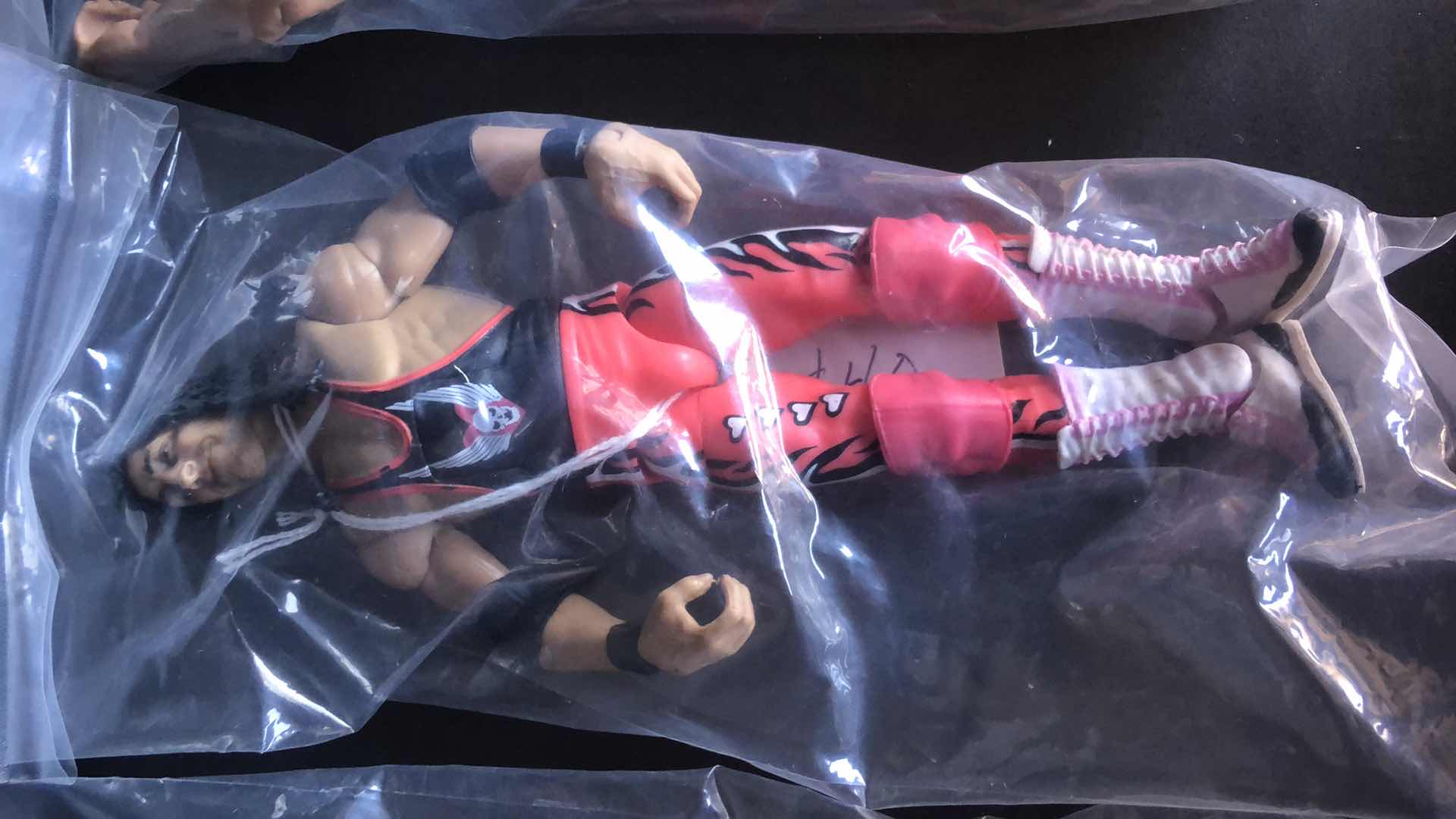Photo 1 of ASSORTMENT OF UNBOXED WRESTLING ACTION FIGURES (4)
