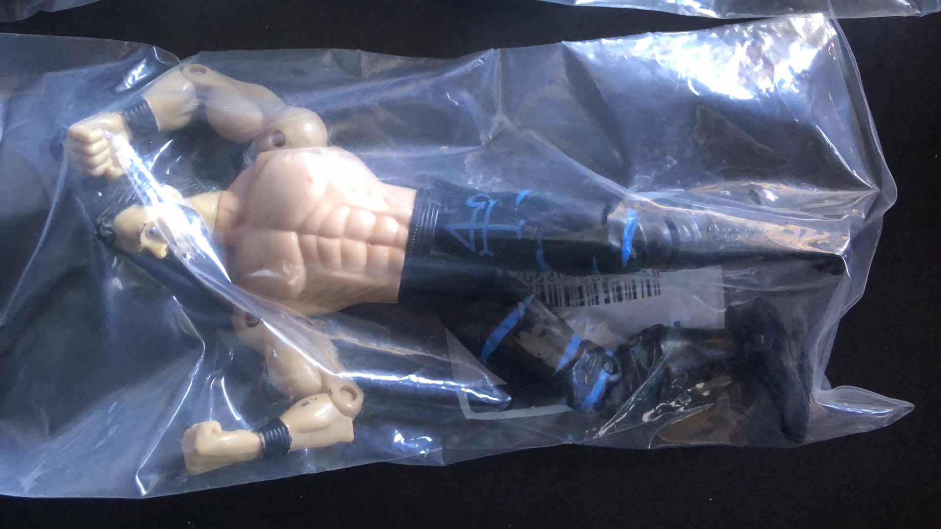 Photo 1 of ASSORTMENT OF UNBOXED WRESTLING ACTION FIGURES (4)