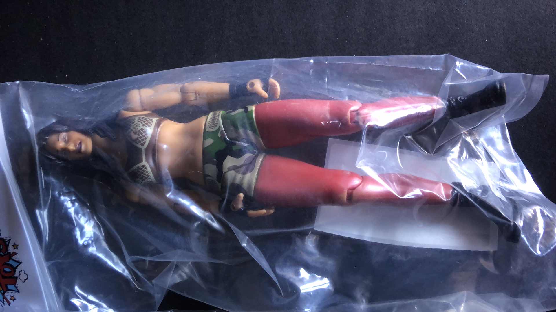 Photo 1 of ASSORTMENT OF UNBOXED WRESTLING ACTION FIGURES (4)