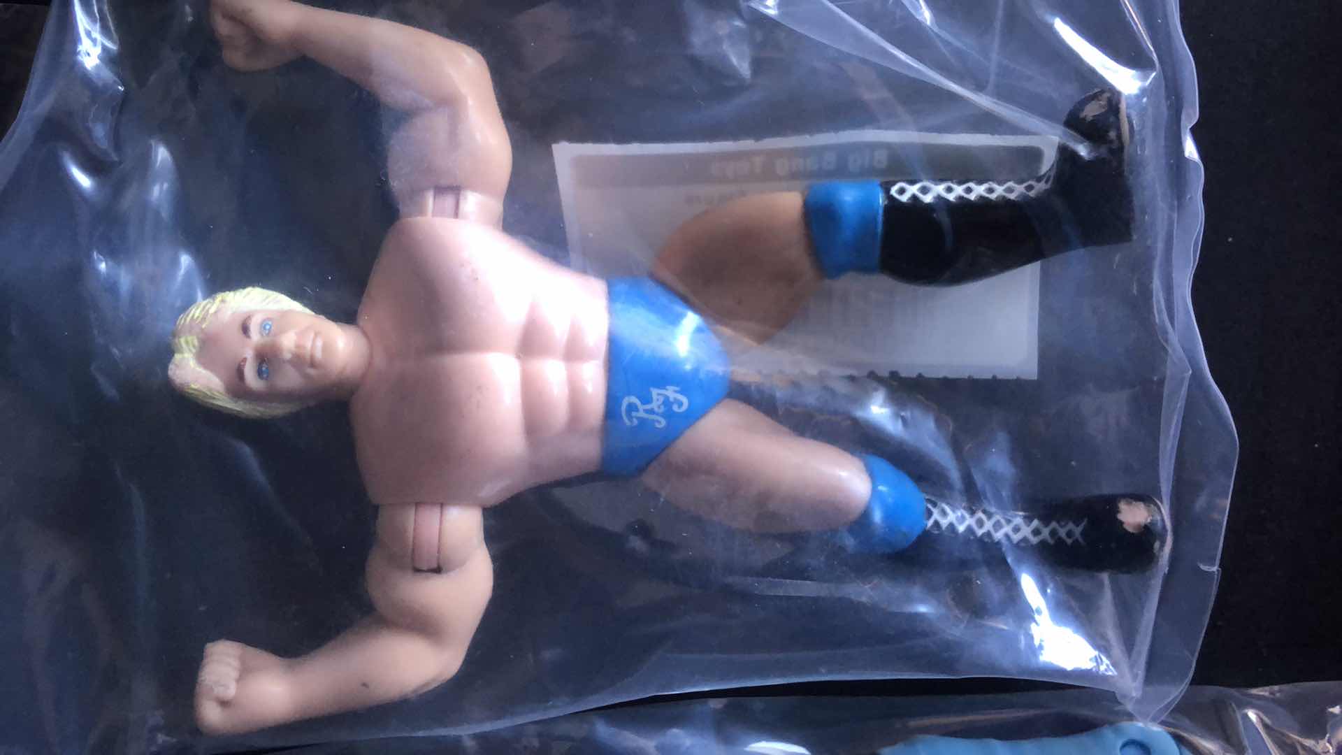 Photo 1 of ASSORTMENT OF UNBOXED WRESTLING ACTION FIGURES (4)