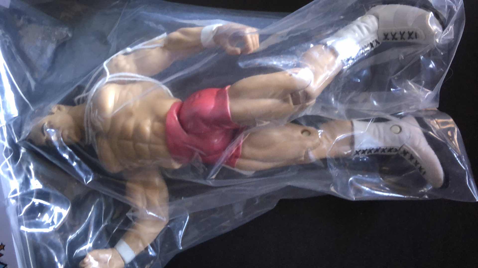 Photo 1 of ASSORTMENT OF UNBOXED WRESTLING ACTION FIGURES (4)