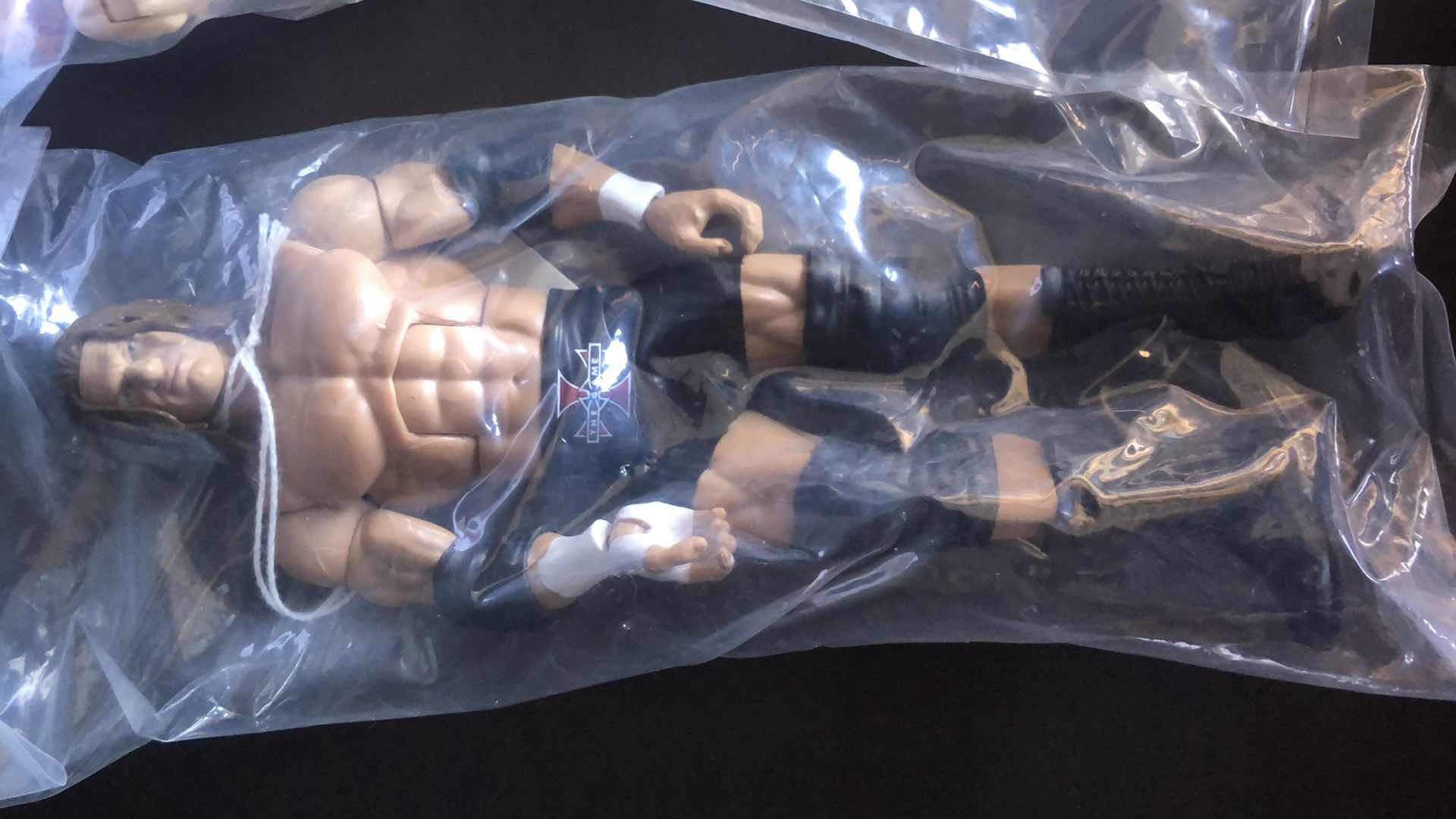 Photo 1 of ASSORTMENT OF UNBOXED WRESTLING ACTION FIGURES (4)