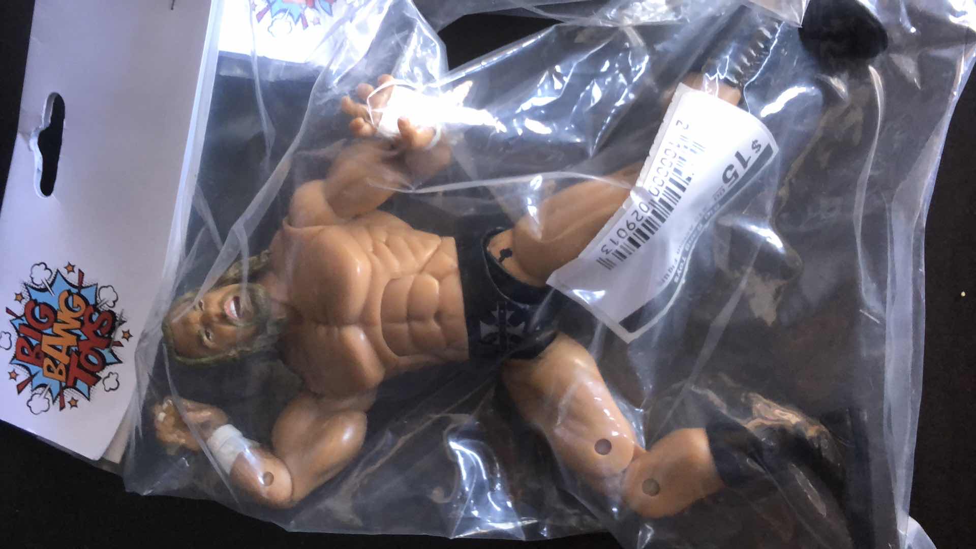 Photo 1 of ASSORTMENT OF UNBOXED WRESTLING ACTION FIGURES (4)