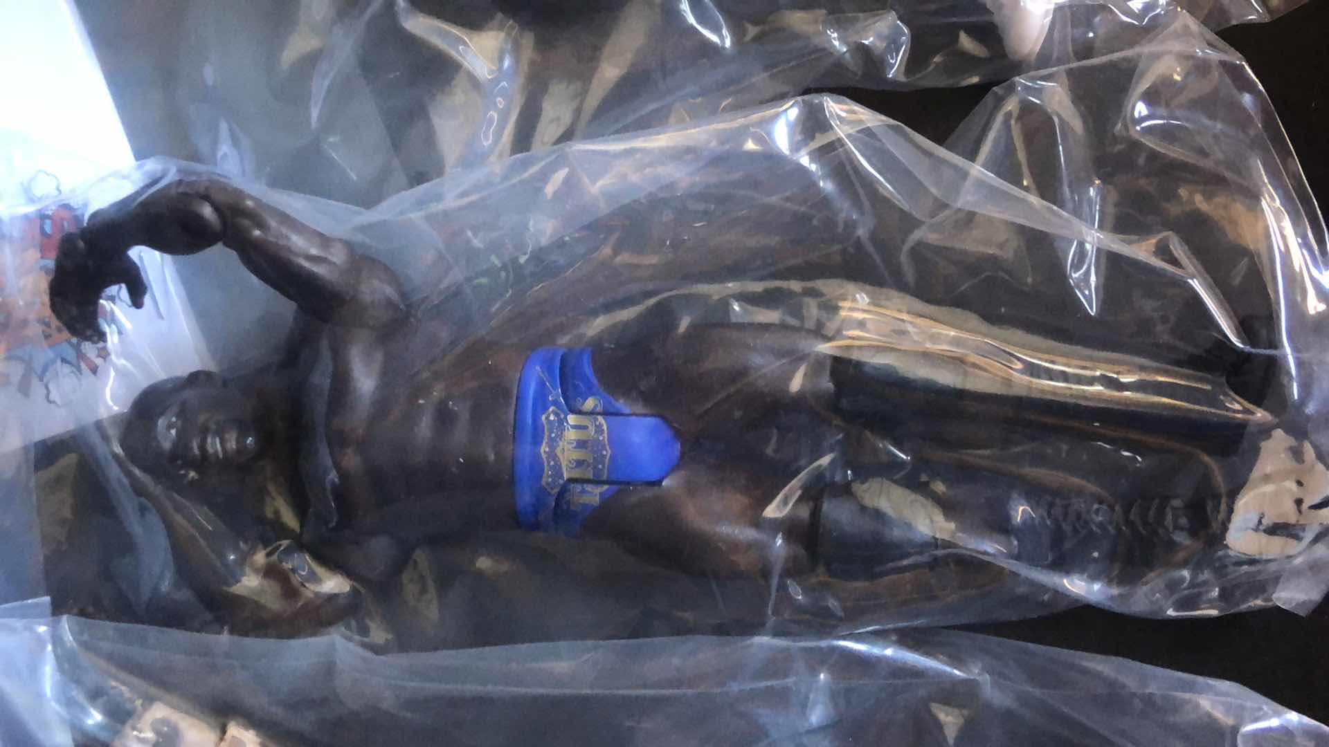 Photo 1 of ASSORTMENT OF UNBOXED WRESTLING ACTION FIGURES (4)