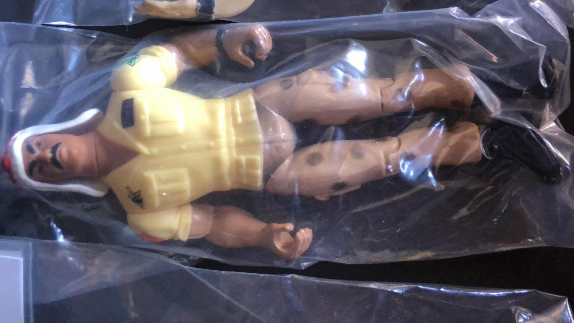 Photo 1 of ASSORTMENT OF UNBOXED WRESTLING ACTION FIGURES (4)