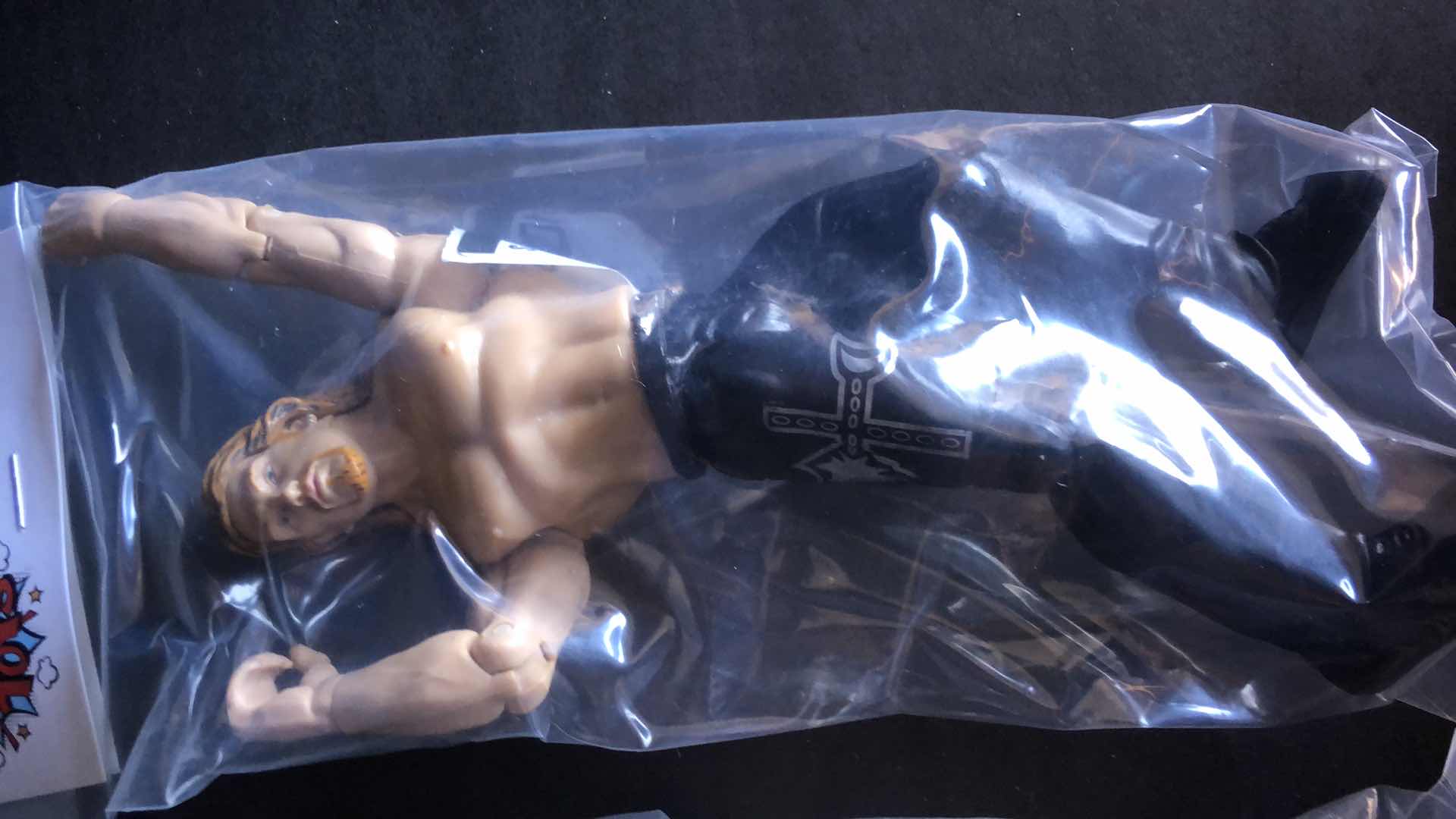 Photo 1 of ASSORTMENT OF UNBOXED WRESTLING ACTION FIGURES (4)