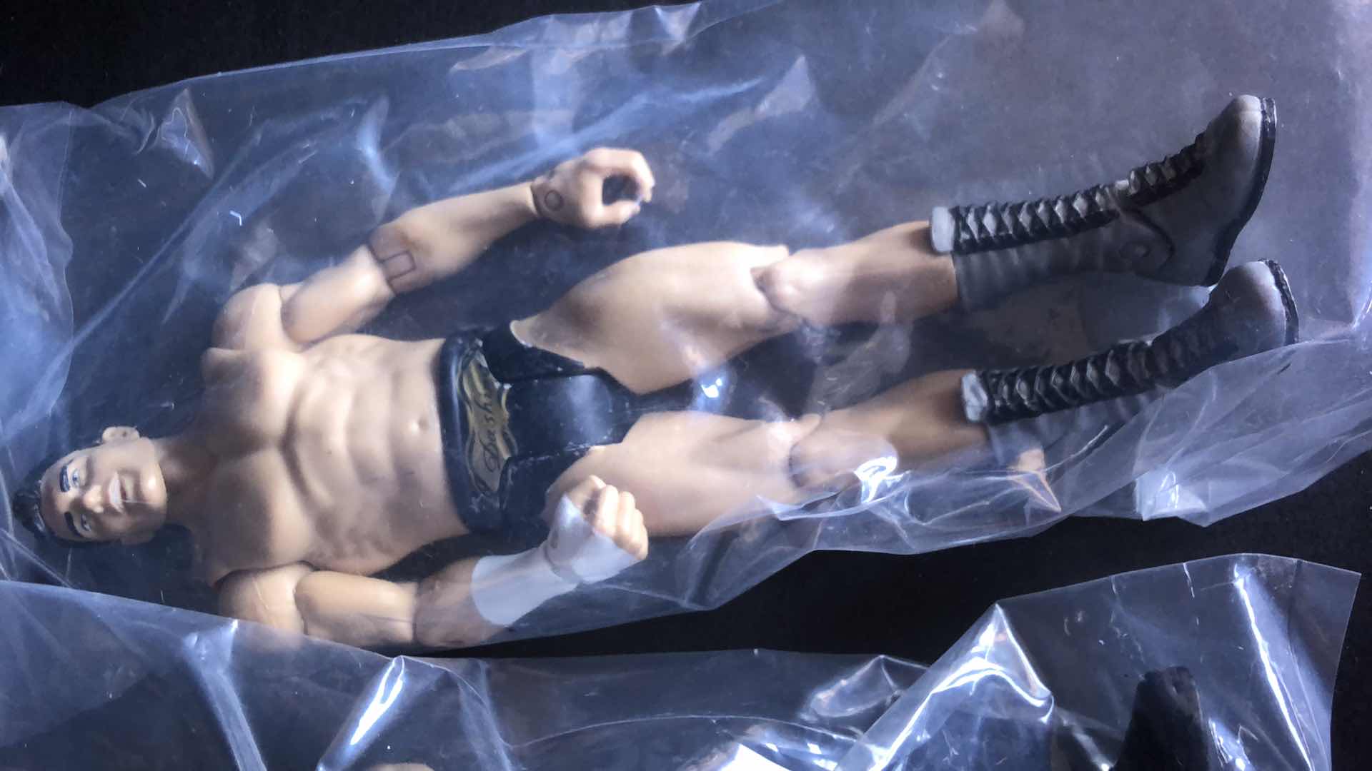 Photo 1 of ASSORTMENT OF UNBOXED WRESTLING ACTION FIGURES (5)