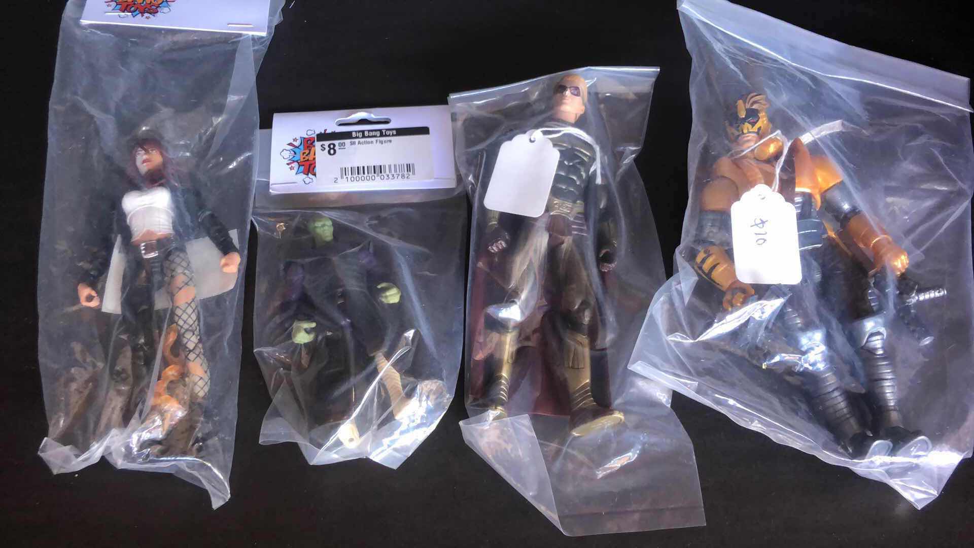 Photo 1 of ASSORTMENT OF UNBOXED SUPER HERO ACTION FIGURES (4)