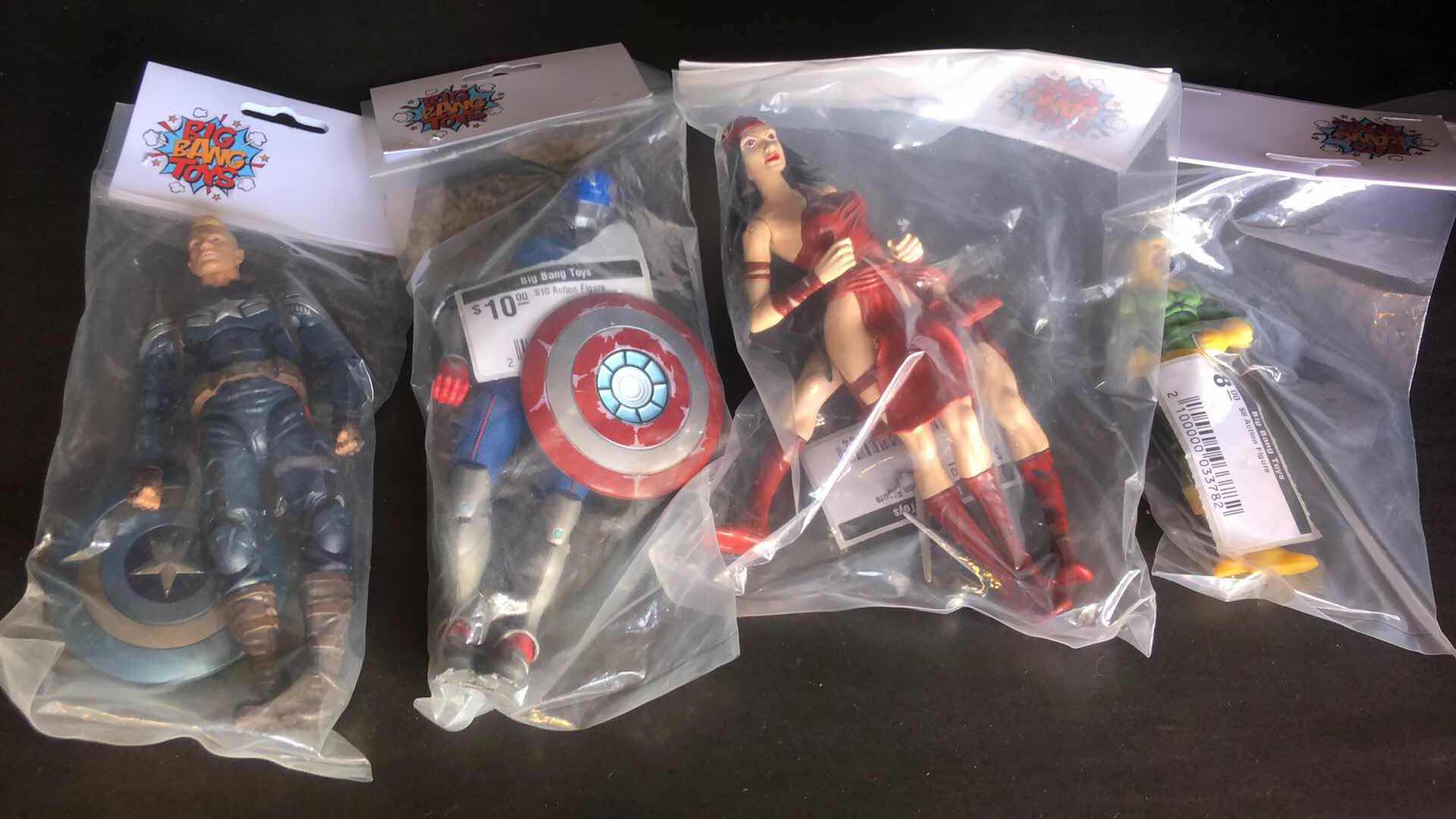 Photo 1 of ASSORTMENT OF UNBOXED SUPER HERO ACTION FIGURES (4)