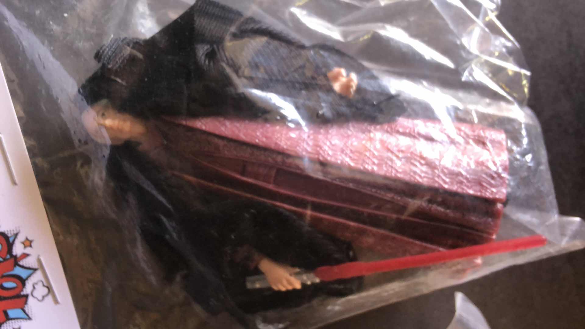 Photo 1 of ASSORTMENT OF UNBOXED ACTION FIGURES STOCKING STUFFERS (2)