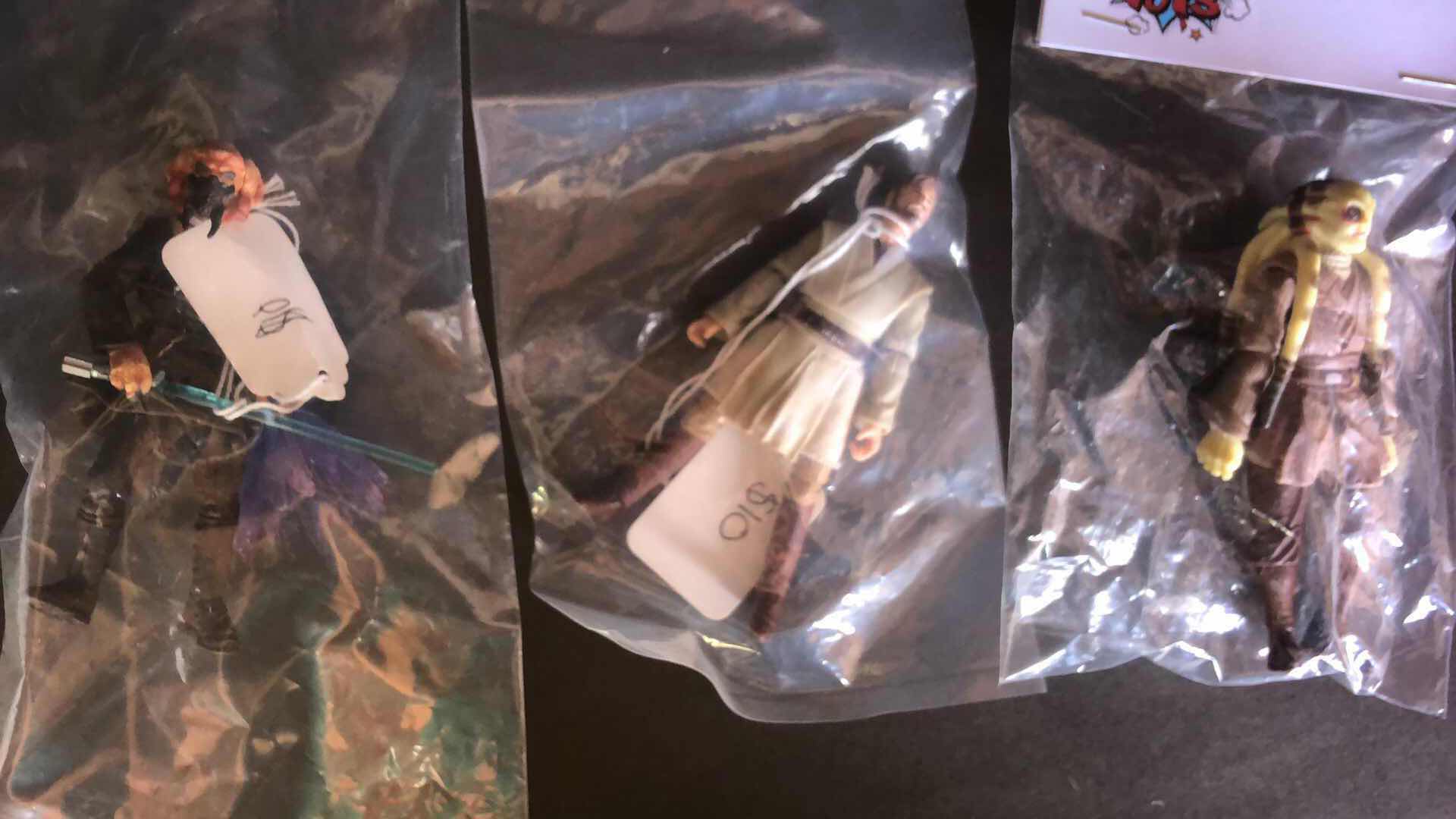 Photo 1 of ASSORTMENT OF UNBOXED ACTION FIGURES STOCKING STUFFERS (3)