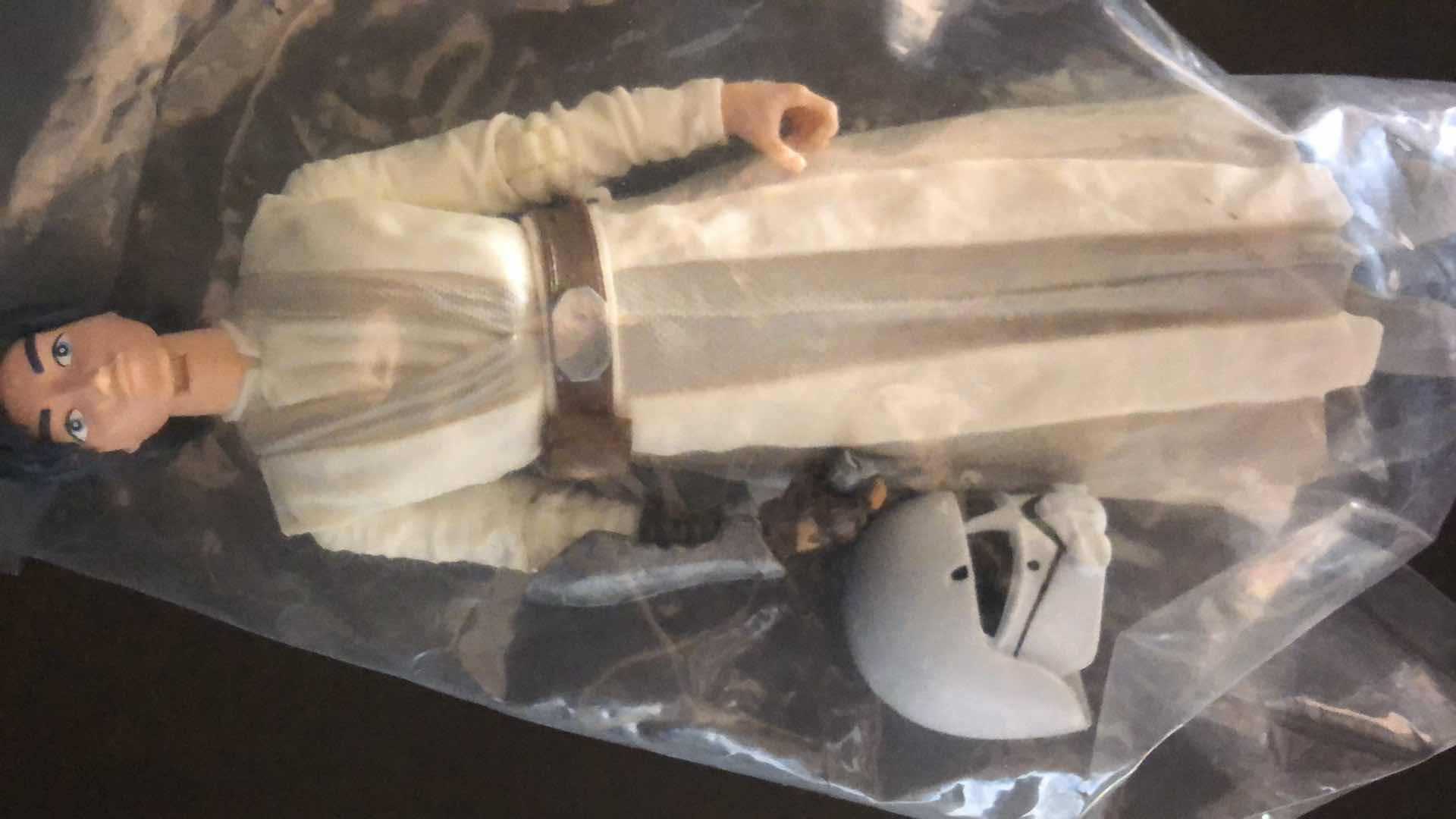 Photo 1 of ASSORTMENT OF UNBOXED ACTION FIGURES STOCKING STUFFERS (2)