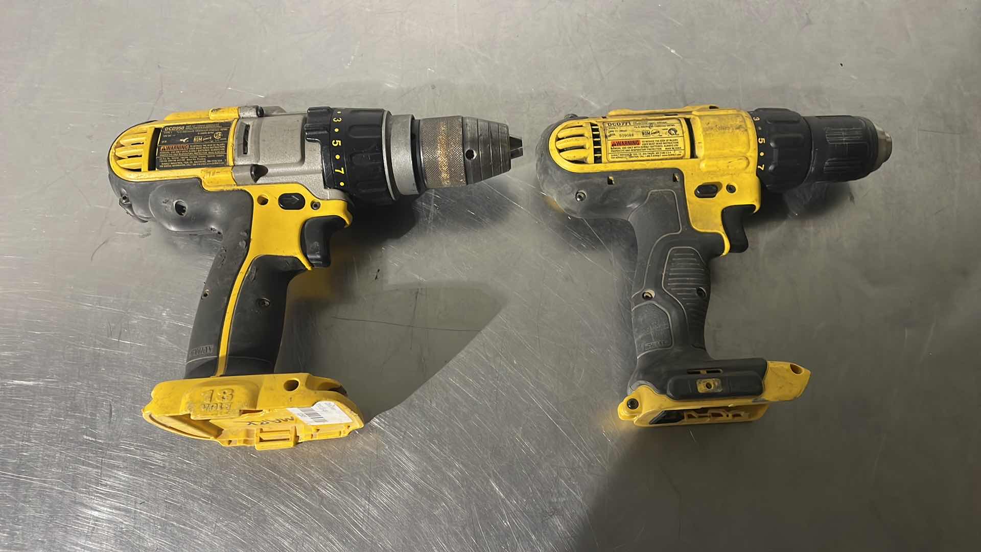Photo 1 of DEWALT DRILL 18V DCD950 AND DEWALT DRILL 20V DCD771 NO BATTERIES BOTH TESTED GOOD.