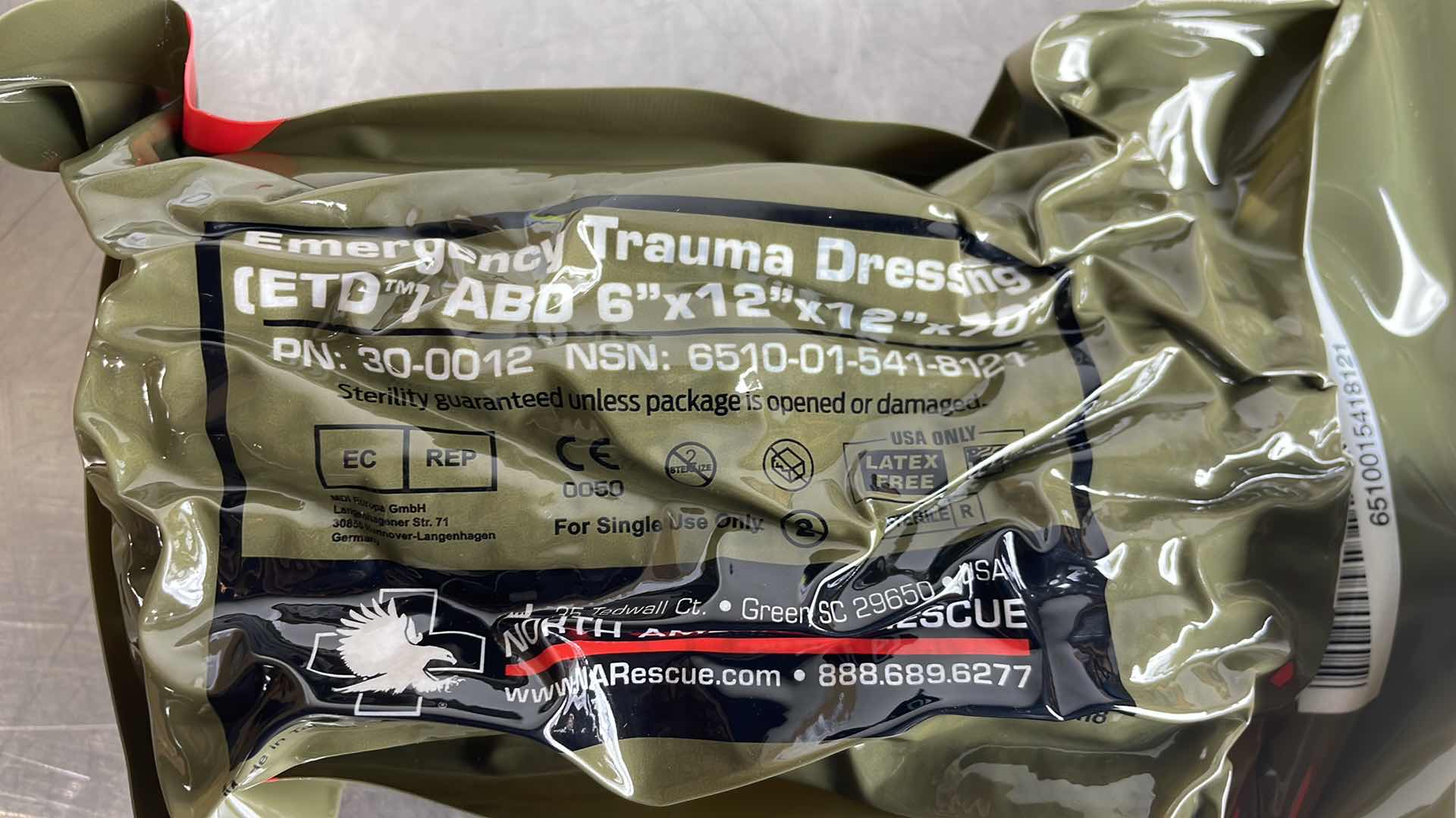 Photo 1 of EMERGENCY TRAUMA DRESSING 6” X 12” X 70” (25) EXP 6/23