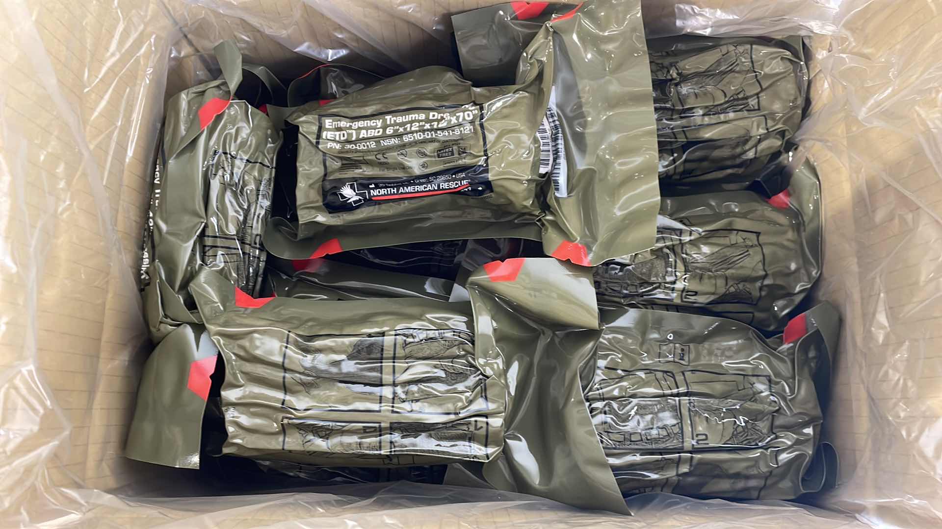 Photo 1 of EMERGENCY TRAUMA DRESSING 6” X 12” X 70” (25) EXP 6/23