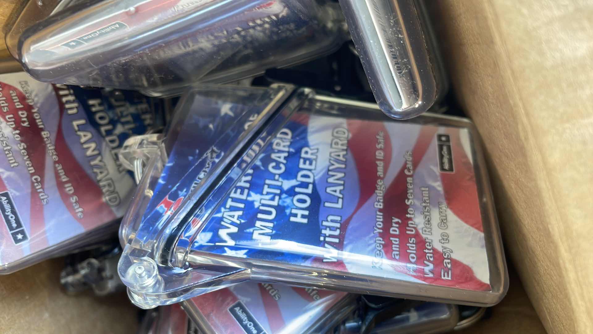 Photo 1 of SKILCRAFT WATERPROOF MULTI CARD HOLDERS WITH LANYARDS (12)