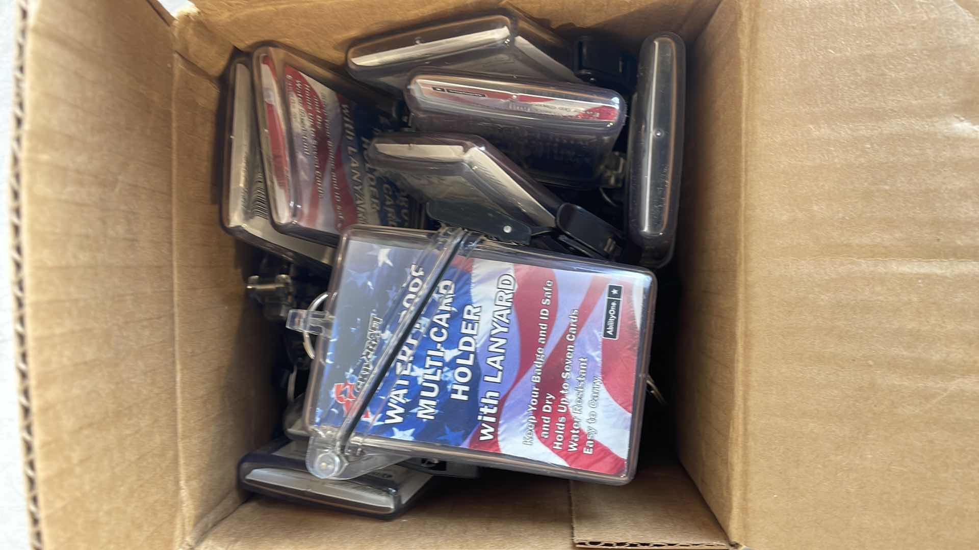 Photo 1 of SKILCRAFT WATERPROOF MULTI CARD HOLDERS WITH LANYARDS (12)