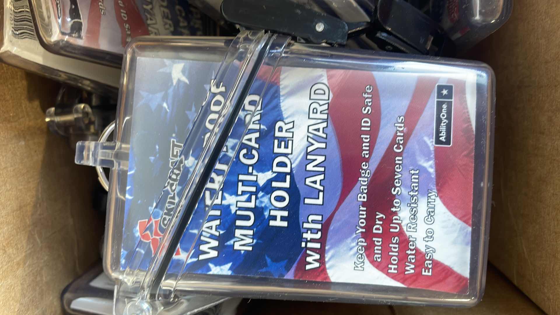 Photo 1 of SKILCRAFT WATERPROOF MULTI CARD HOLDERS WITH LANYARDS (12)