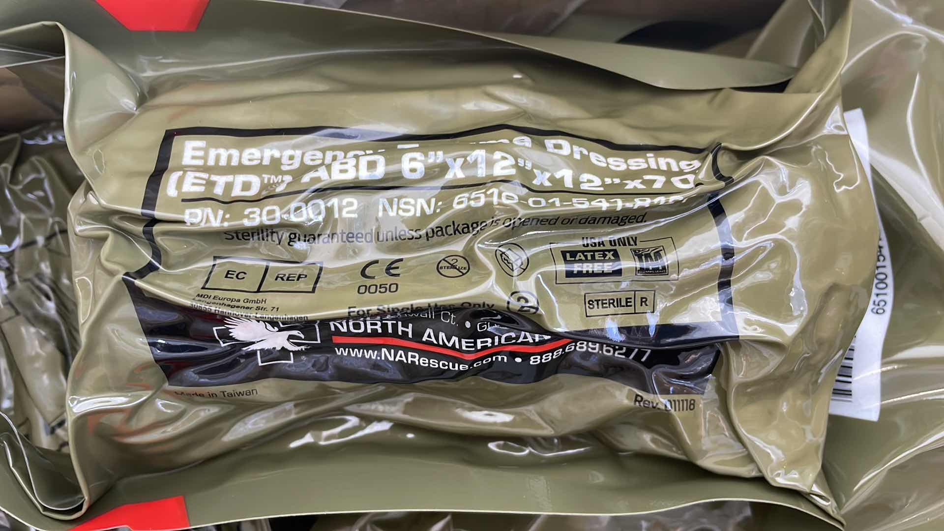 Photo 1 of EMERGENCY TRAUMA DRESSING 6” X 12” X 70” (25) EXP 6/23