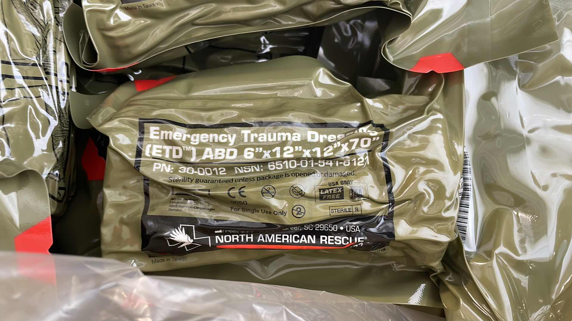 Photo 1 of EMERGENCY TRAUMA DRESSING 6” X 12” X 70” (25) EXP 6/23