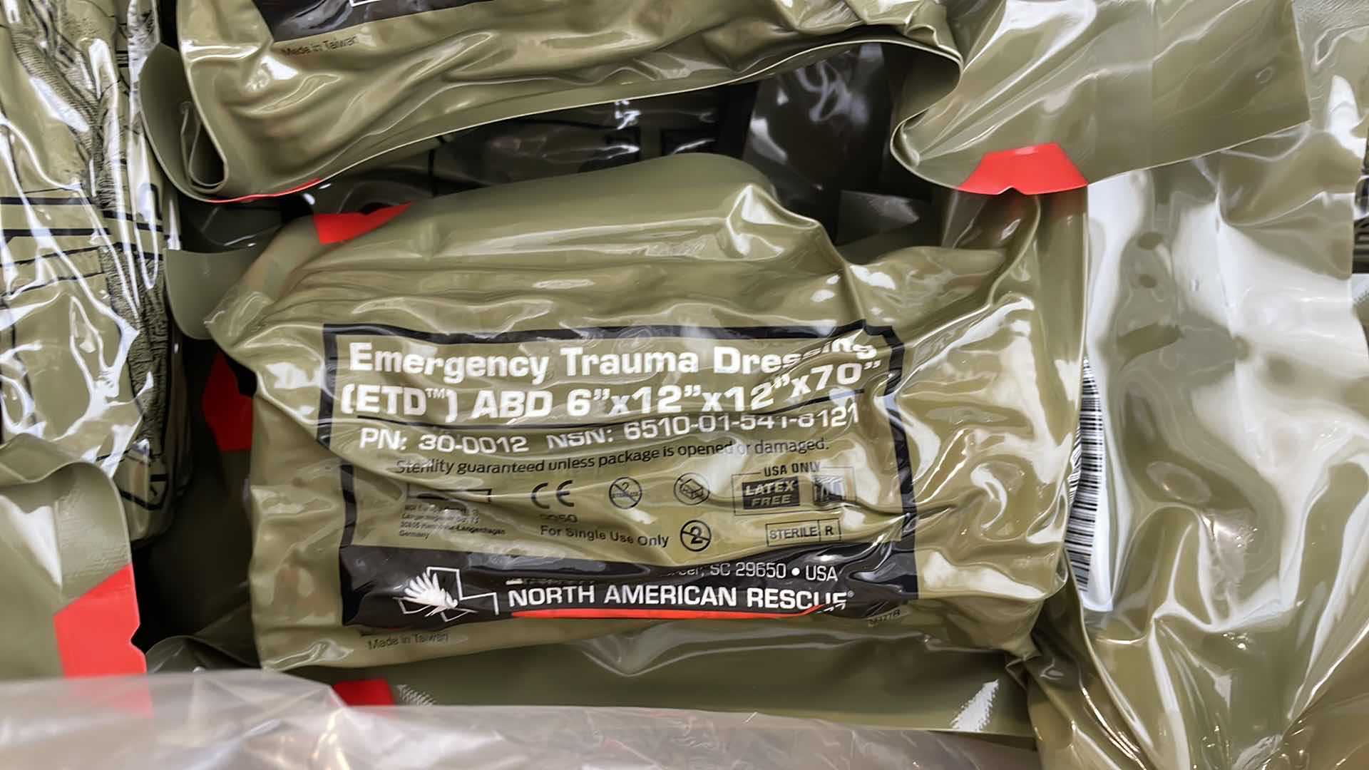 Photo 1 of EMERGENCY TRAUMA DRESSING 6” X 12” X 70” (25) EXP 6/23