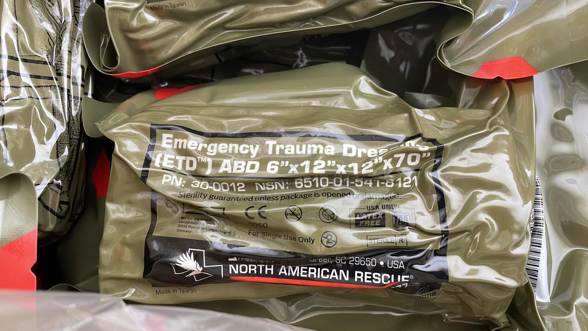 Photo 1 of EMERGENCY TRAUMA DRESSING 6” X 12” X 70” (25) EXP 6/23