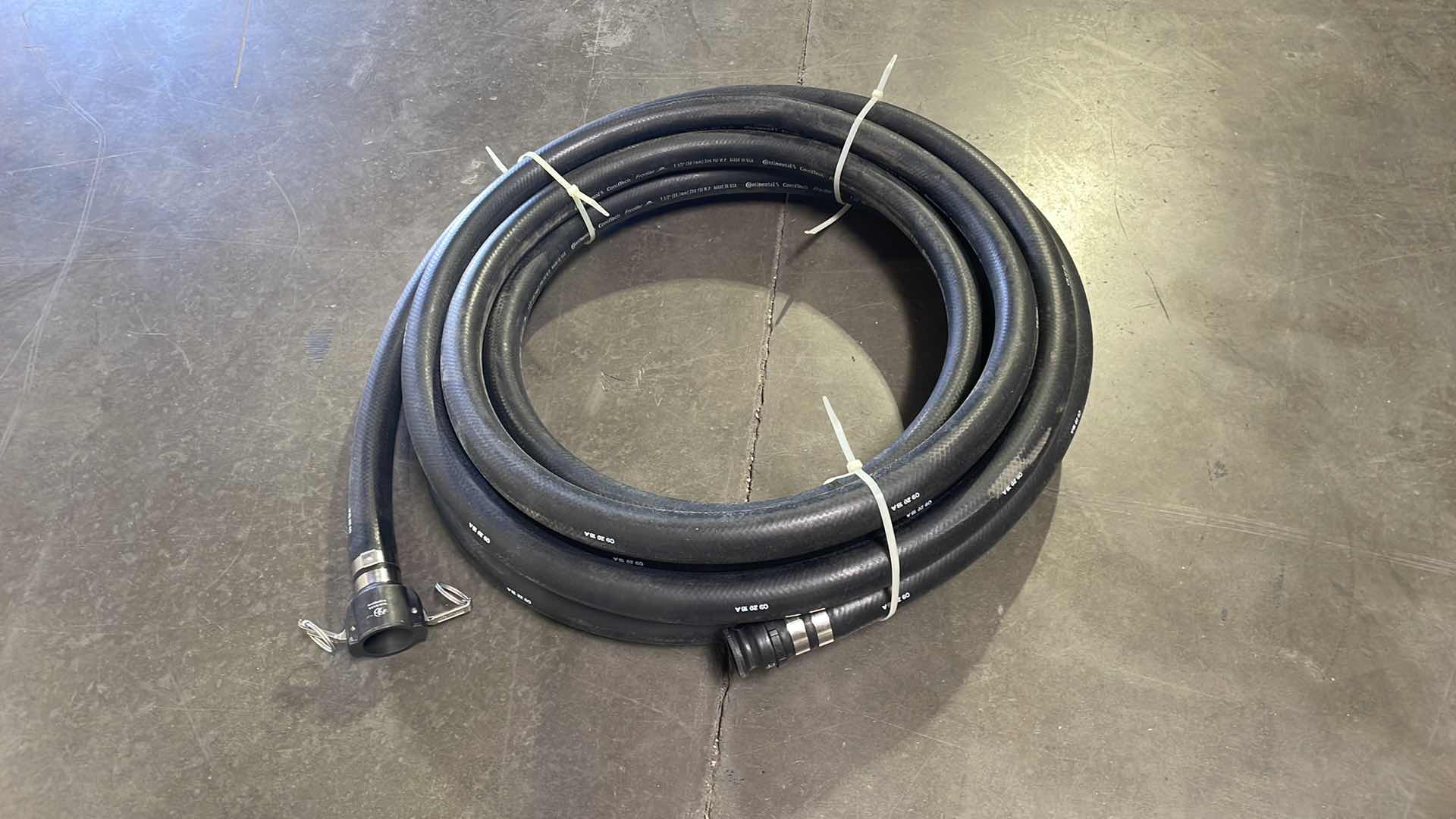 Photo 1 of CONTINENTAL CONTITECH FRONTIER 1-1/2” HOSE WITH CAMLOCK FITTINGS 25’ USA