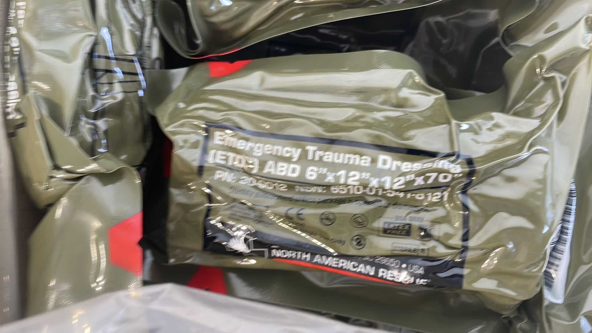 Photo 1 of EMERGENCY TRAUMA DRESSING 6” X 12” X 70” (25) EXP 6/23