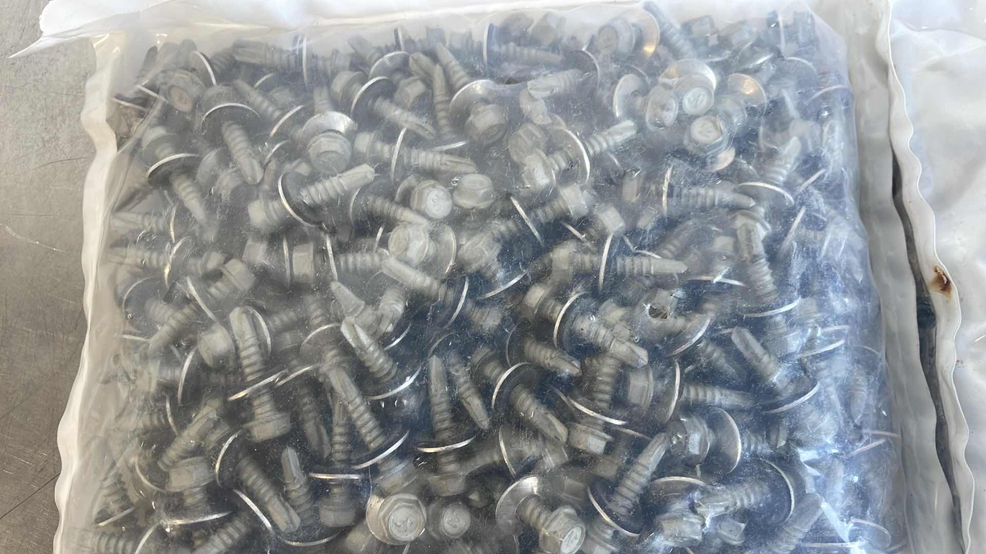 Photo 2 of #12-14 X 1-1/2" EXTERNAL HEX WASHER HEAD ROOFING DRILL POINT SCREW (500)