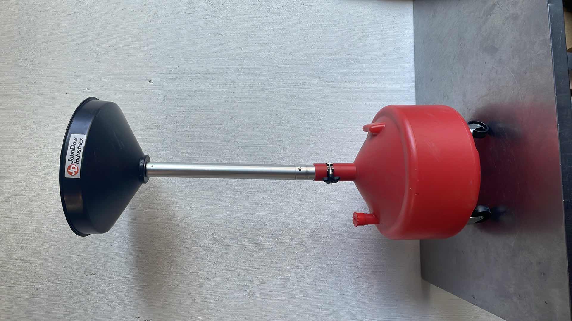 Photo 1 of JOHNDOW INDUSTRIES POLY PORTABLE ECONOMY OIL LIFT DRAIN ADJUSTABLE HEIGHT 48” - 67” W/WHEELS FOR EASY MANEUVERABILITY.