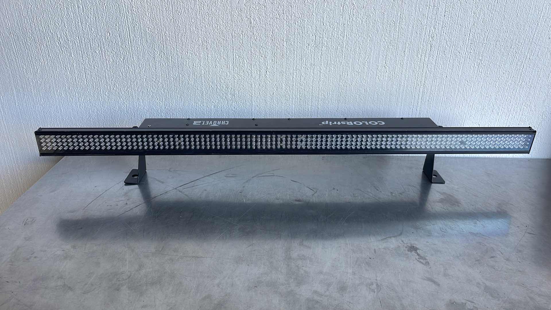 Photo 1 of CHAUVET DJ COLORSTRIP LED LINEAR WASH LIGHT W/BUILT-IN AUTOMATED AND SOUND ACTIVE PROGRAMS , BLACK 38"L X 6"W X 2.5"H